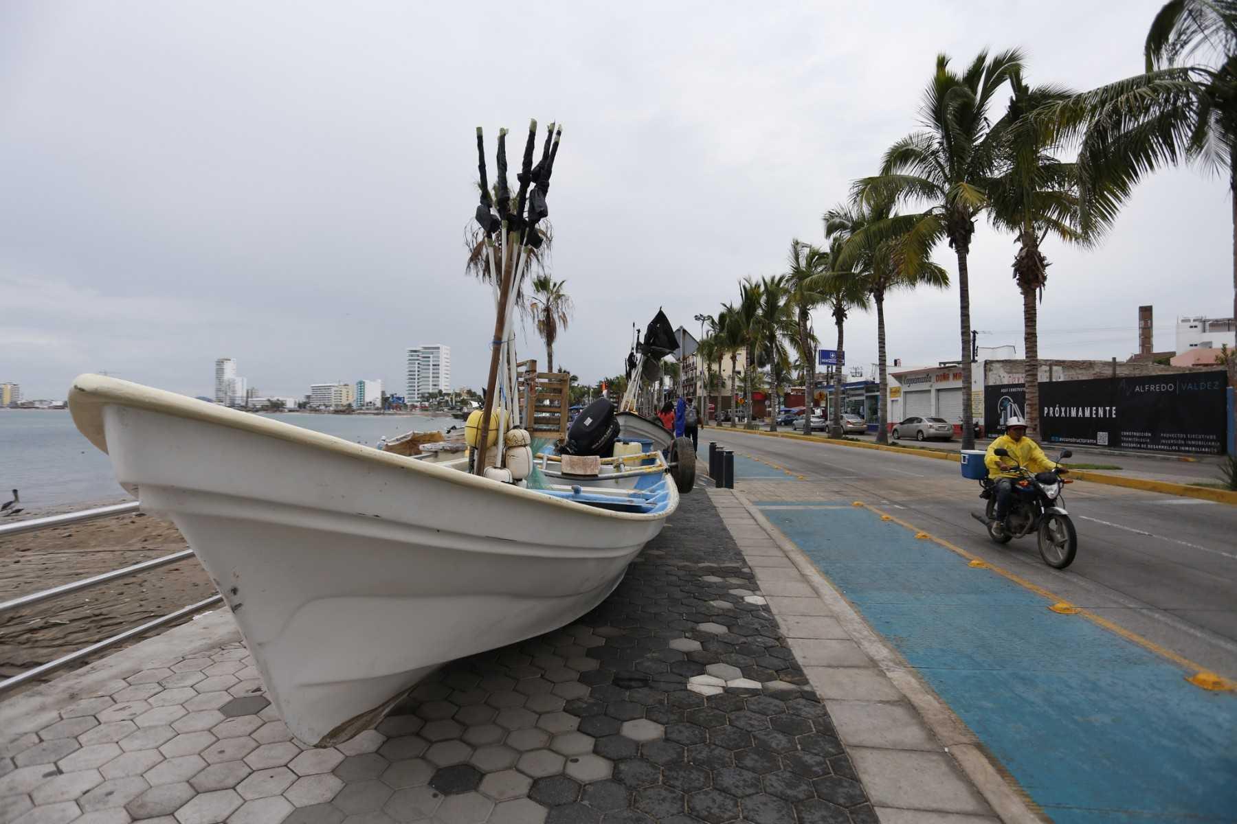 Picture of a boat removed from the sea and placed on the sidewalk ahead of the arrival of Hurricane Orlene, in Mazatlan, state of Sinaloa, Mexico, on Oct 2. Photo Reuters

