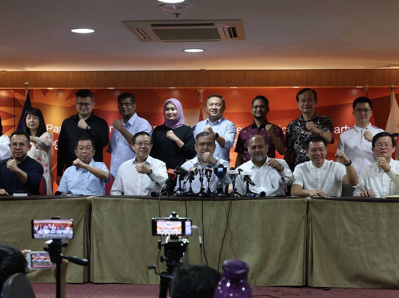 DAP secretary-general Anthony Loke Siew Fook (centre) with other members of the central executive committee at a press conference in Kuala Lumpur last night. Photo: Bernama