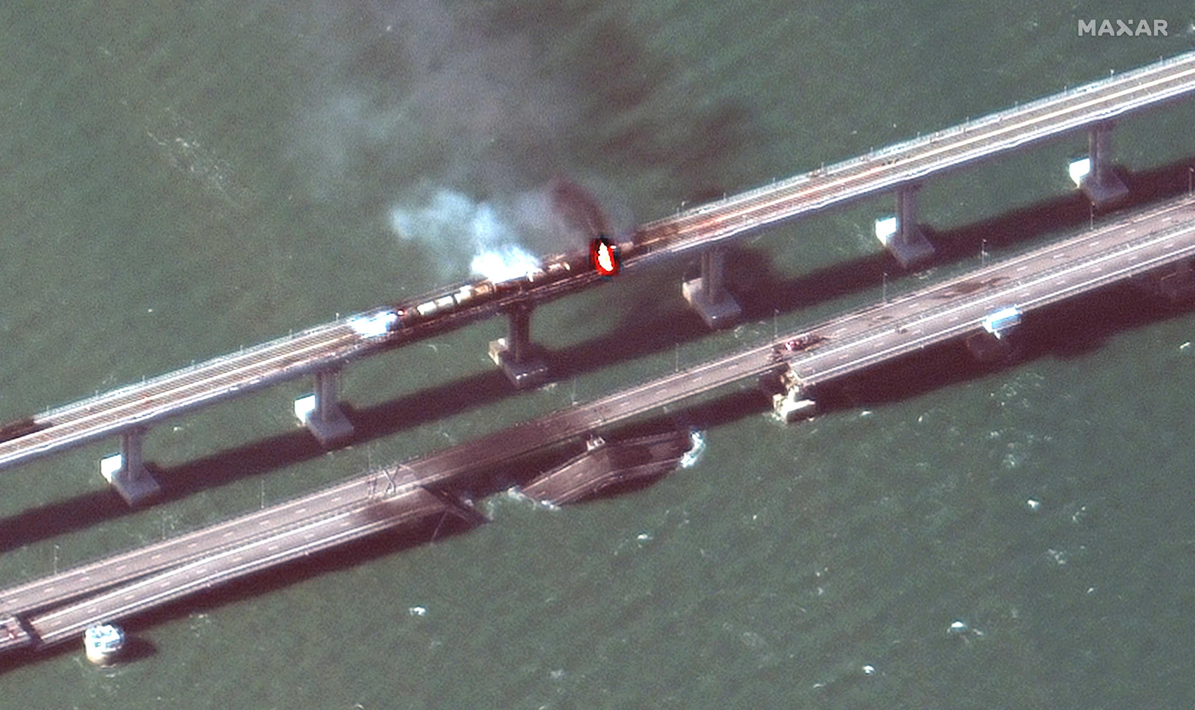 A satellite image shows a close up view of smoke rising from a fire on the Kerch bridge in the Kerch Strait, Crimea, Oct 8. Photo: Reuters