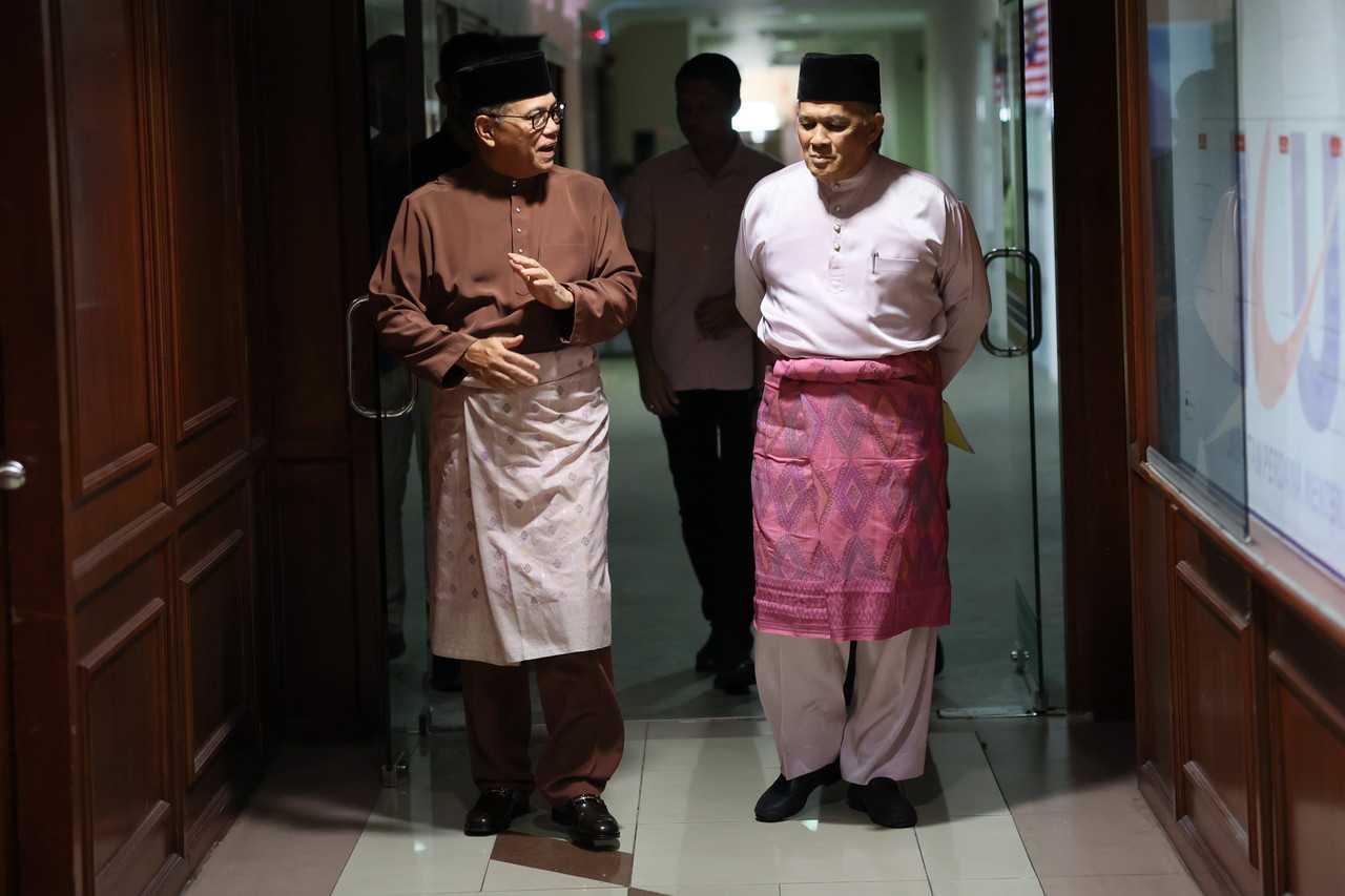 Pahang Menteri Besar Wan Rosdy Wan Ismail (left) with Pahang speaker Ishak Muhamad ahead of a press conference at Wisma Sri Pahang in Kuantan today. Photo: Bernama