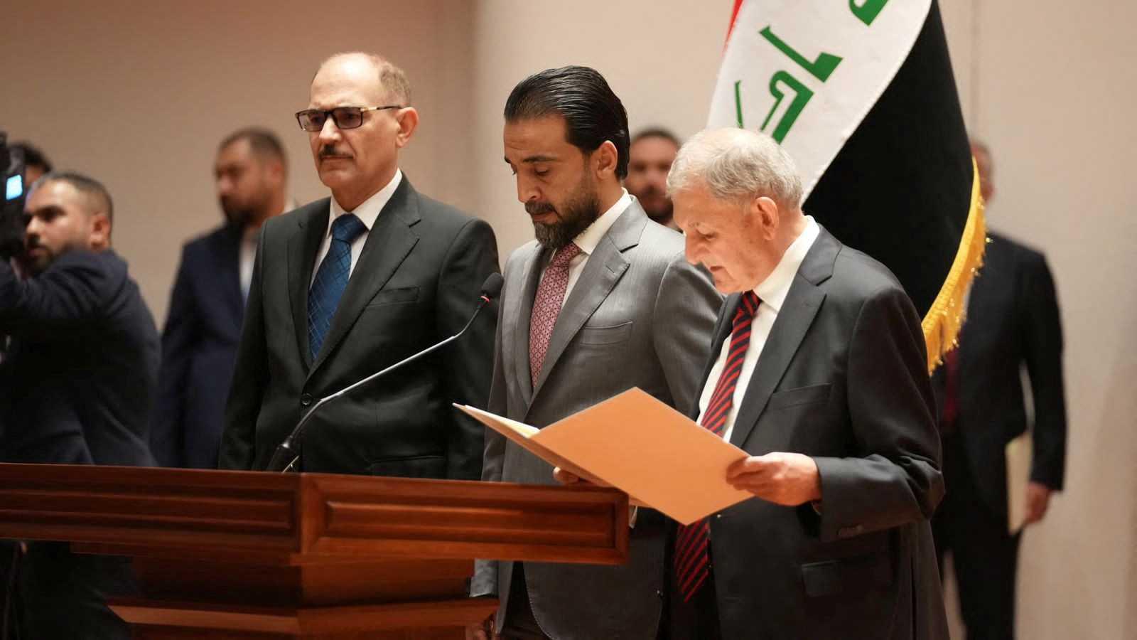 Abdul Latif Rashid takes his oath of office in front of Iraqi lawmakers in Baghdad, Iraq, Oct 13. Photo: Reuters
