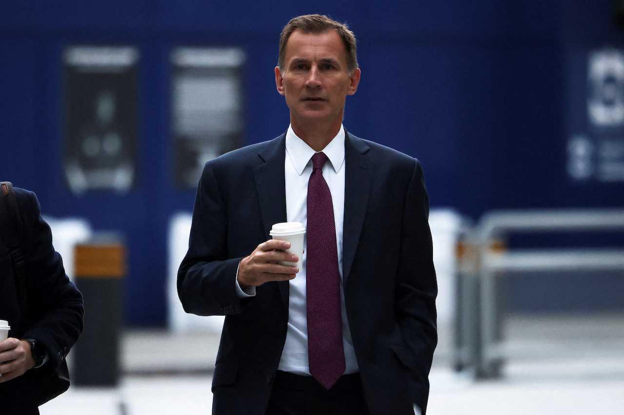 British Chancellor of the Exchequer Jeremy Hunt arrives at the BBC, in London, Britain, Oct 15. Photo: Reuters