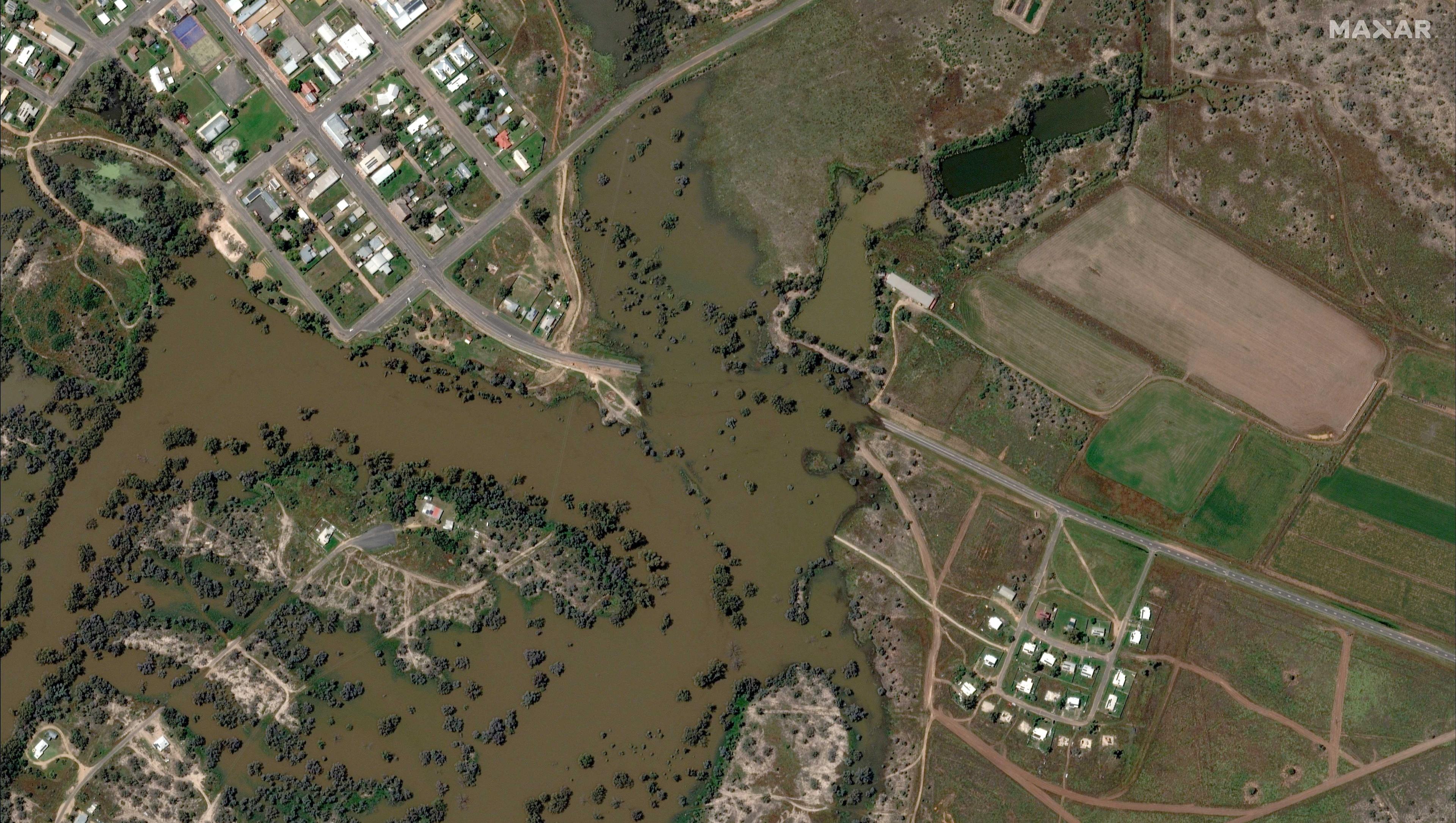 A satellite image shows a flooded road in Brewarrina, Australia, Oct 15. Photo: Reuters