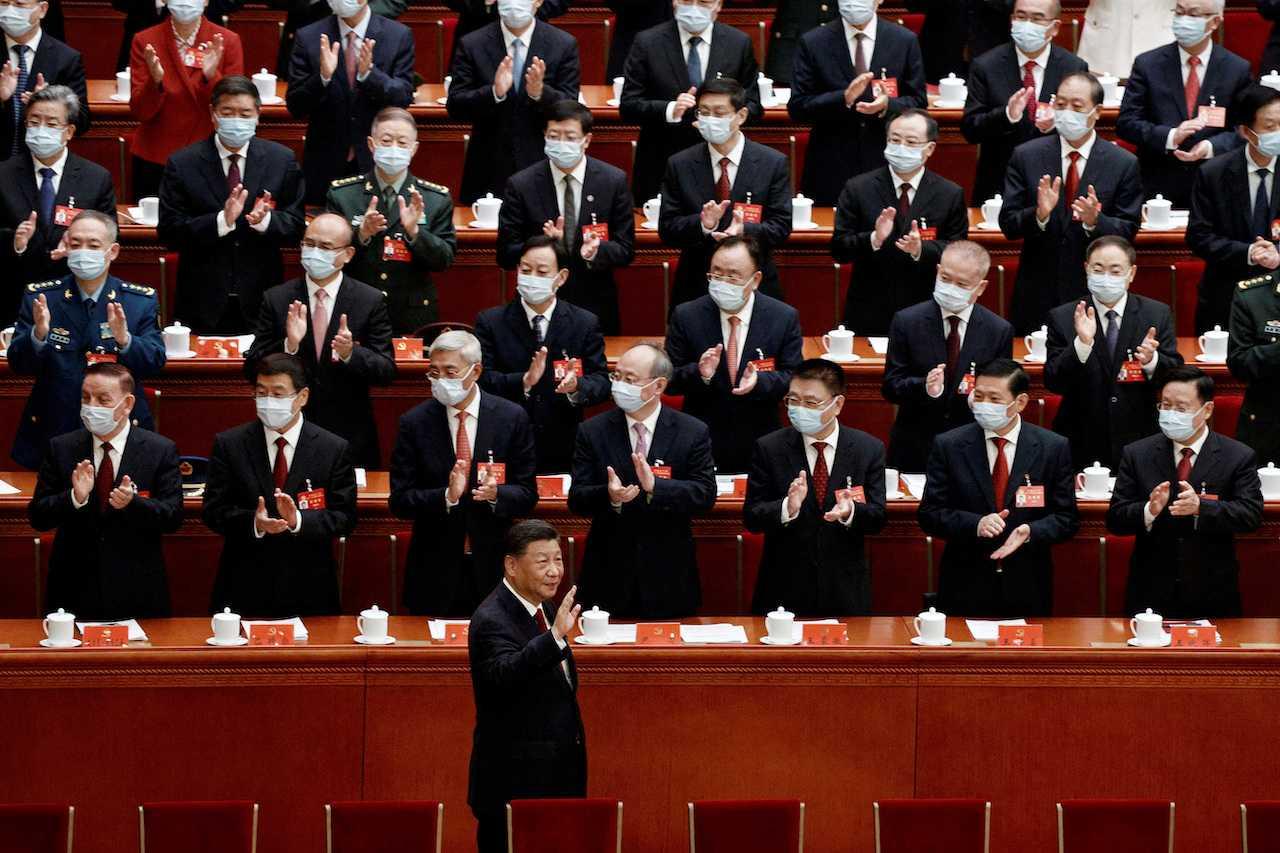 Chinese President Xi Jinping waves as he arrives for the opening ceremony of the 20th National Congress of the Communist Party of China, at the Great Hall of the People in Beijing, Oct 16. Photo: Reuters