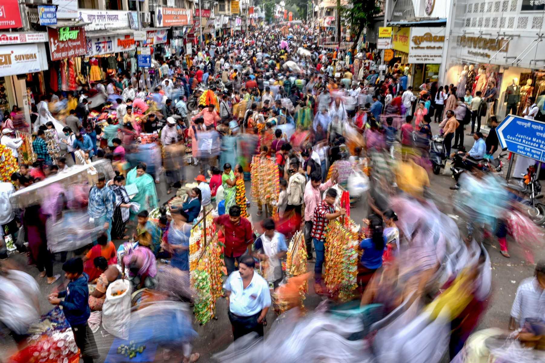 People walk through a market for last minute shopping ahead of Deepavali in Mumbai on Oct 21. Muslims are the biggest minority group in India, accounting for 13% of the population of 1.4 billion, the majority of whom are Hindu. Photo: AFP