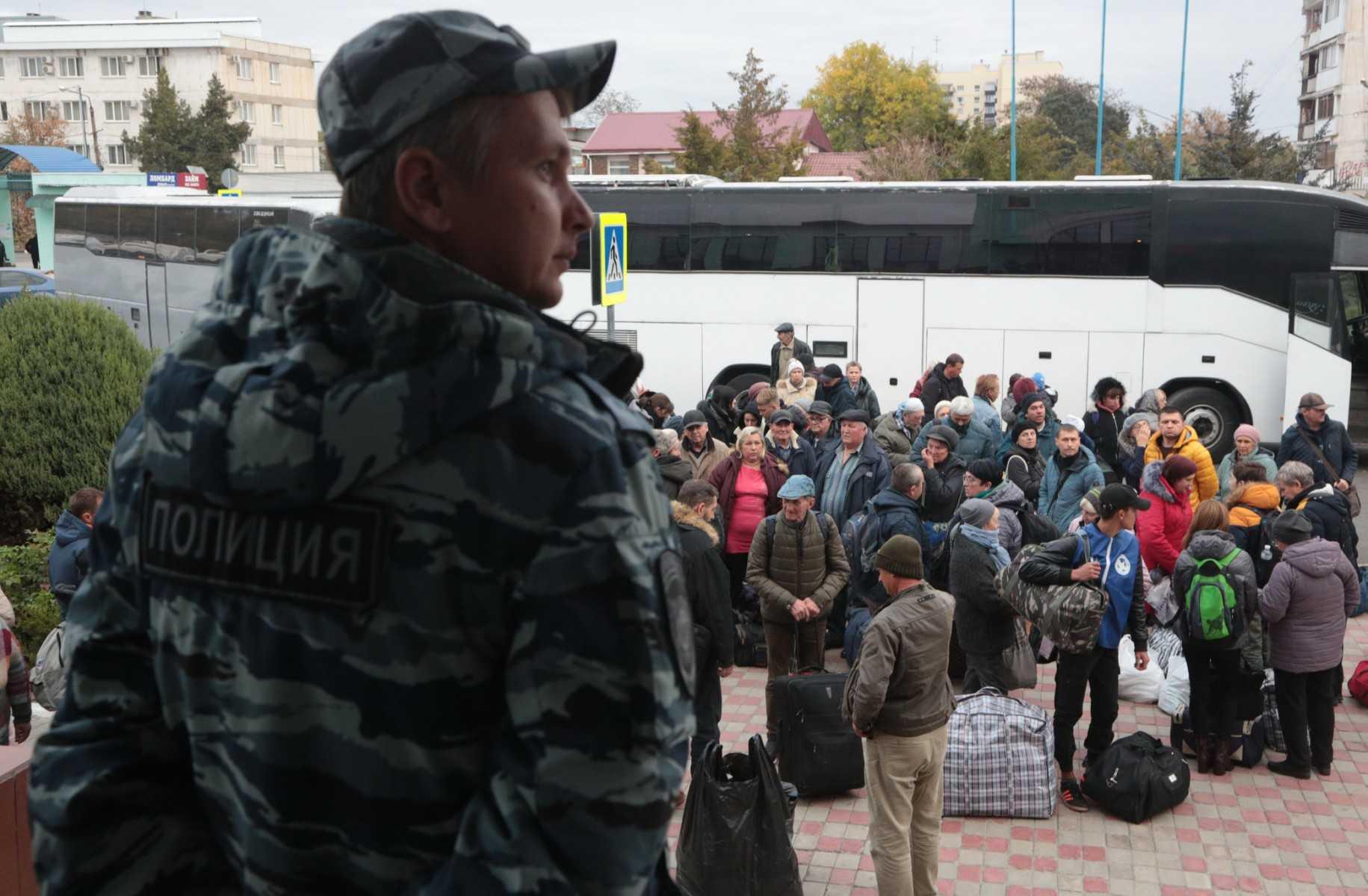 People arrived from Kherson wait for further evacuation into the depths of Russia at the Dzhankoi's railway station in Crimea on Oct 21. Photo: AFP
