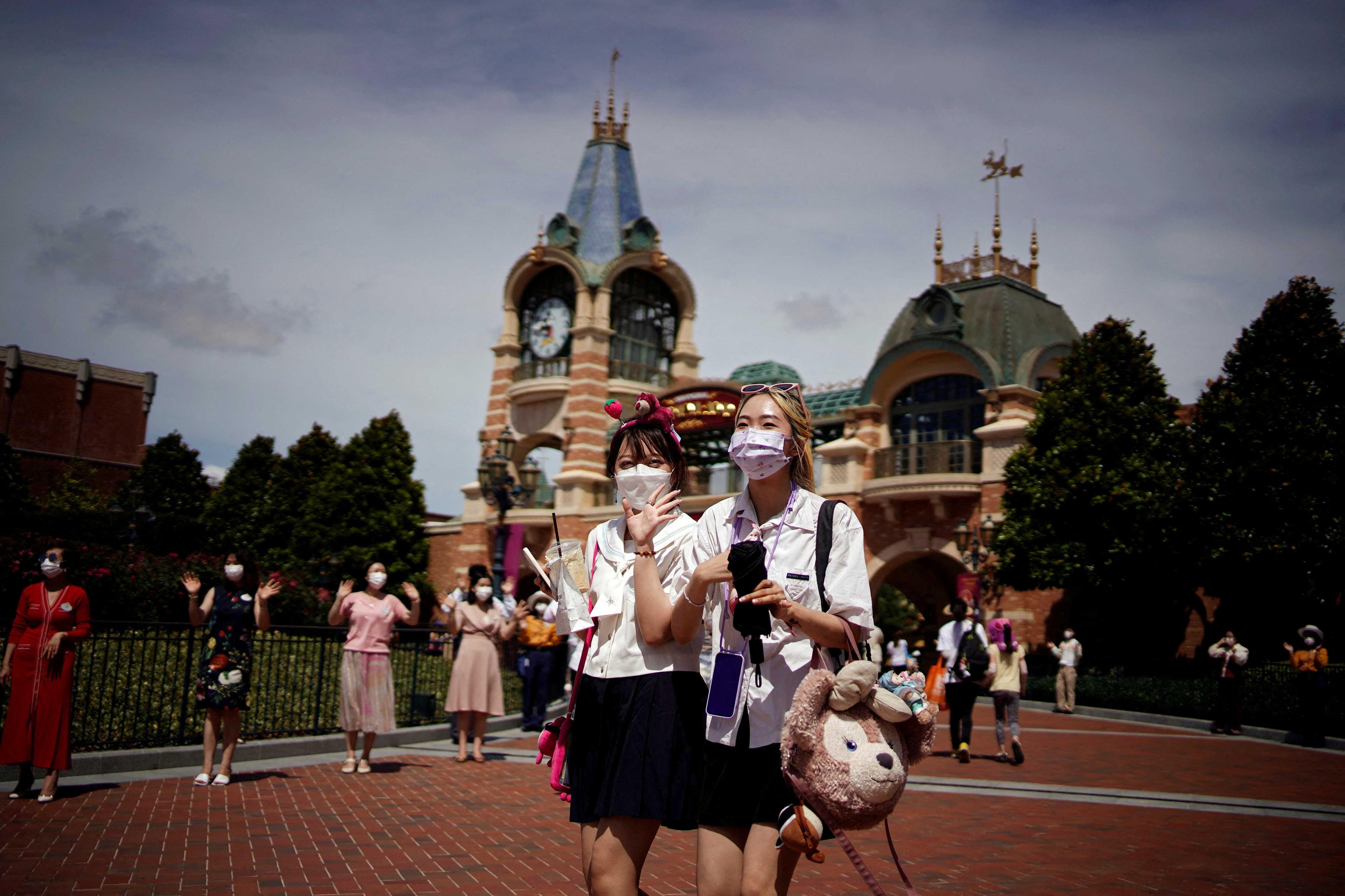 People wearing face masks visit the Shanghai Disney Resort, as the Shanghai Disneyland theme park reopens after being shut for the Covid-19 outbreak, in Shanghai, China June 30. Photo: Reuters