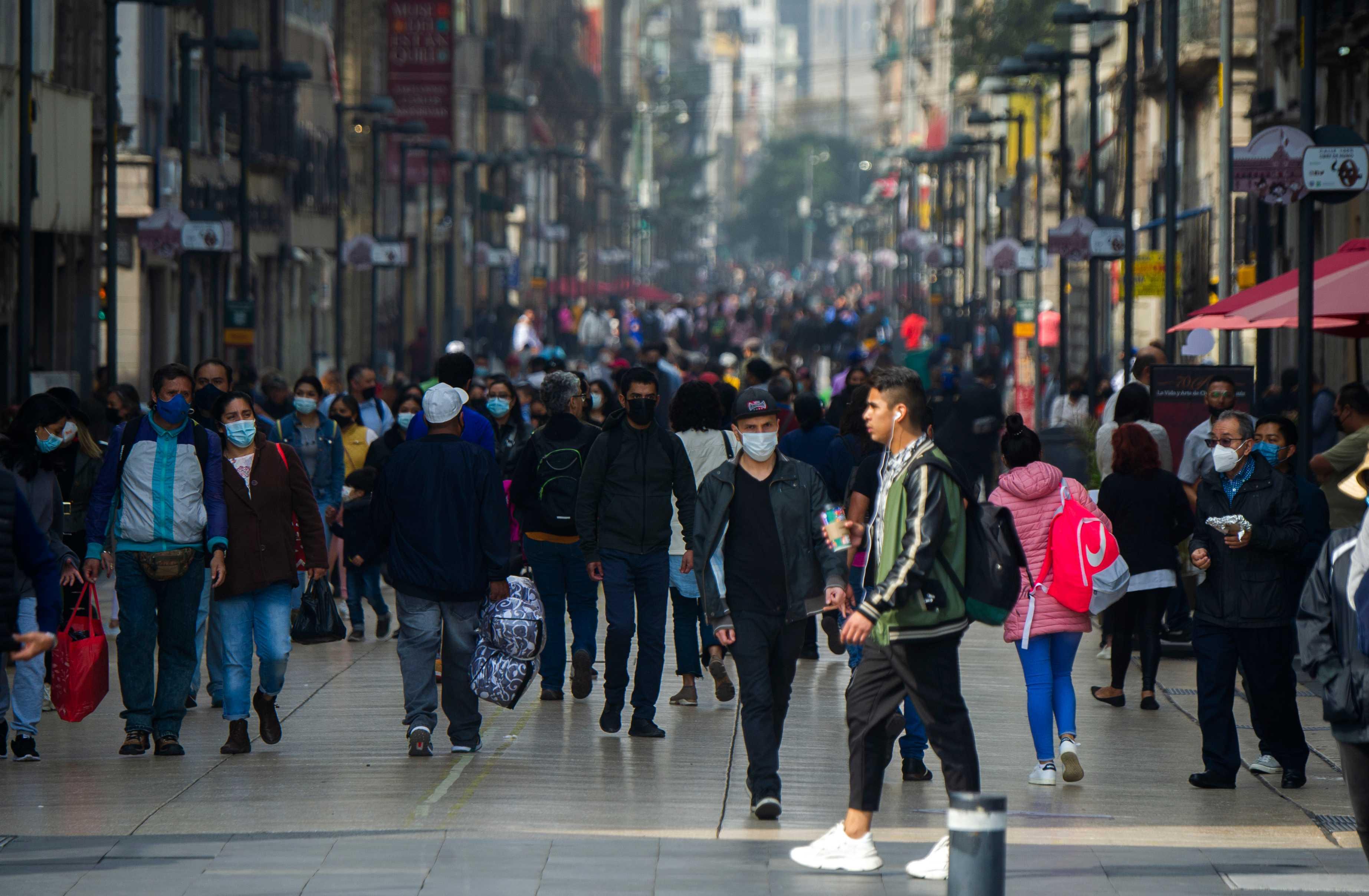 People walk through the historic centre in Mexico City, on Jan 16. Photo: AFP 