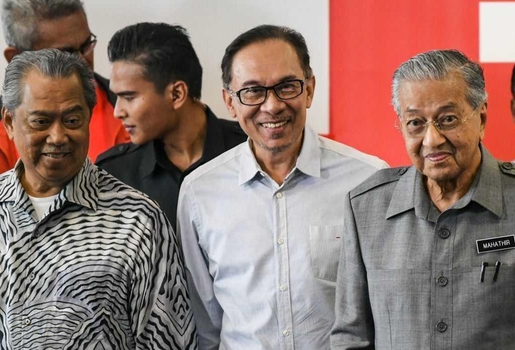 Perikatan Nasional chairman Muhyiddin Yassin (left) with PKR president Anwar Ibrahim and former prime minister Dr Mahathir Mohamad in this file picture. Photo: AFP
