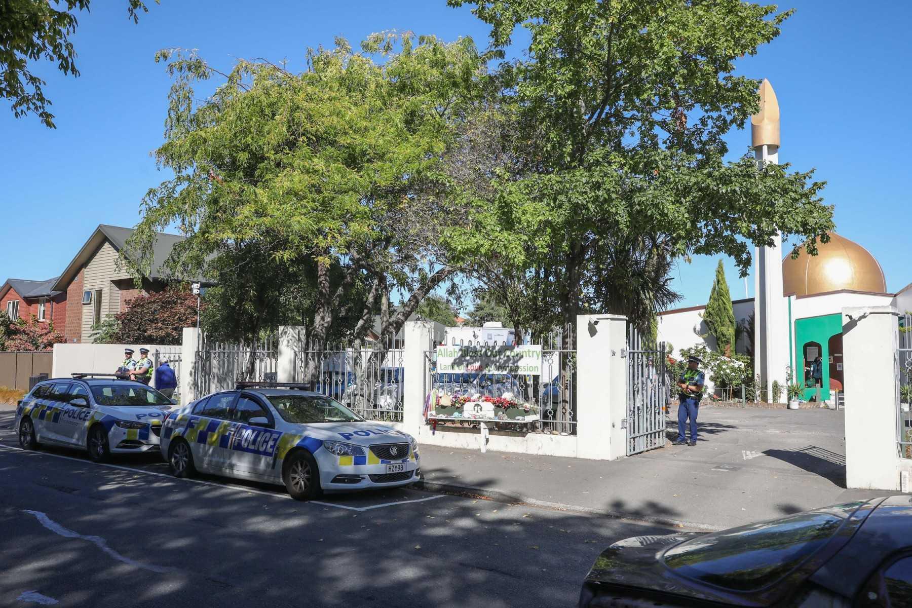 This picture shows police vehicles parked outside Al Noor Mosque in Christchurch on March 13, 2021, before a memorial service to mark two years since the Christchurch mosque mass shootings. Photo: AFP