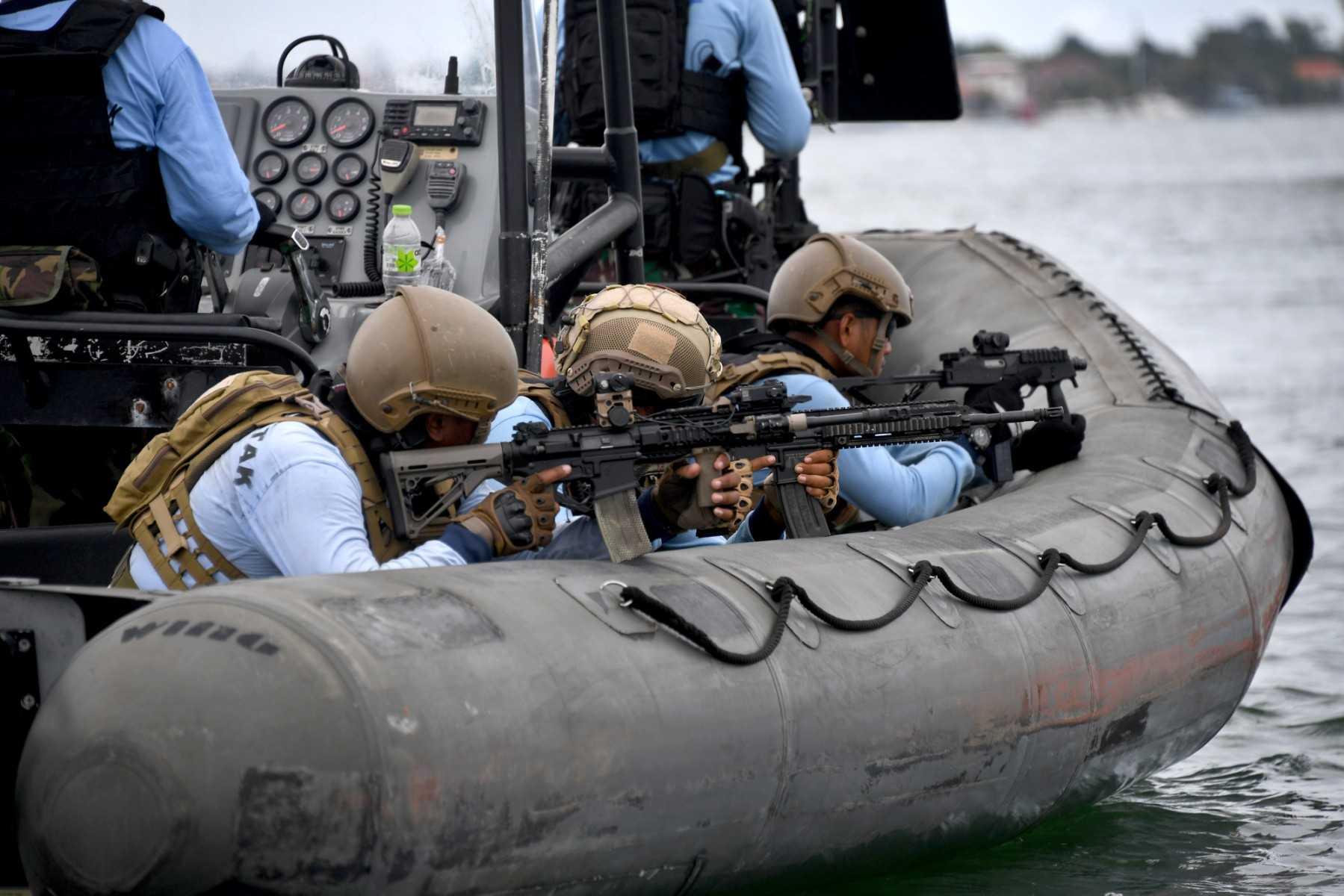 Indonesia Navy Frogman Forces Command personnel take part in a security drill ahead of G20 summit at Benoa harbour in Denpasar, on Indonesia resort island of Bali on Nov 9. Photo: AFP
