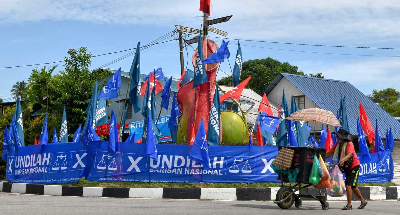Party flags cover the kerb at a junction in Balik Pulau, Penang. Photo: Bernama
