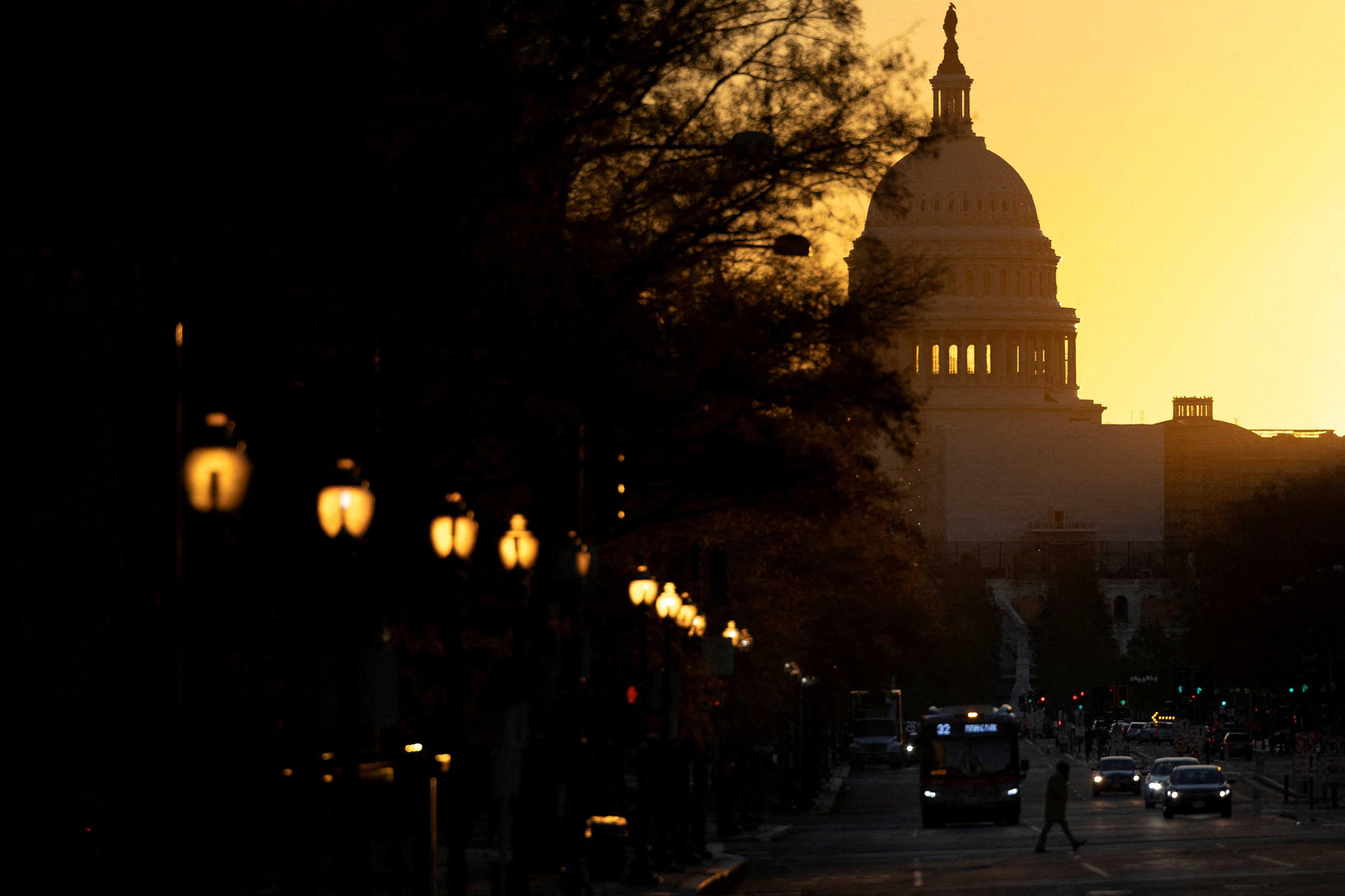 The sun rises over the US Capitol, as control of Congress remained unclear following the 2022 US midterm elections in Washington, US, Nov 9. Photo: Reuters