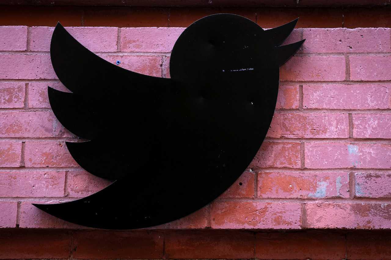 The Twitter logo is seen outside the offices in New York City, US, Nov 9. Photo: Reuters