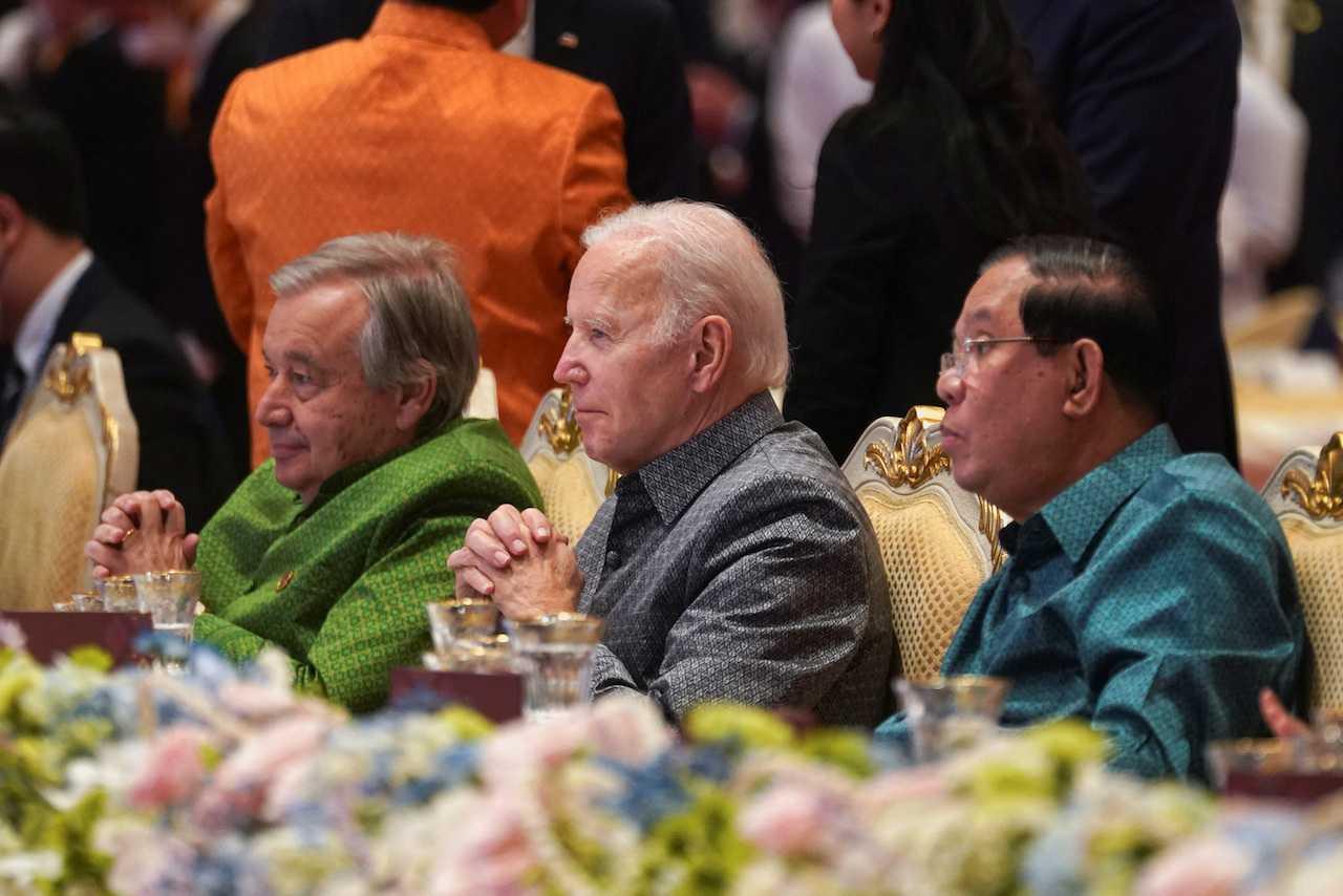US President Joe Biden watches a cultural performance next to Cambodia's Prime Minister Hun Sen and UN secretary-general Antonio Guterres during a gala dinner, as the Asean summit continues, in Phnom Penh, Cambodia, Nov 12. Photo: Reuters