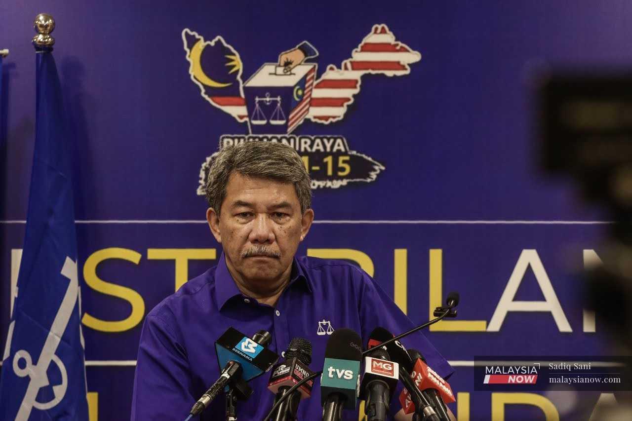Umno deputy president Mohamad Hasan speaks at a press conference in Kuala Lumpur today.
