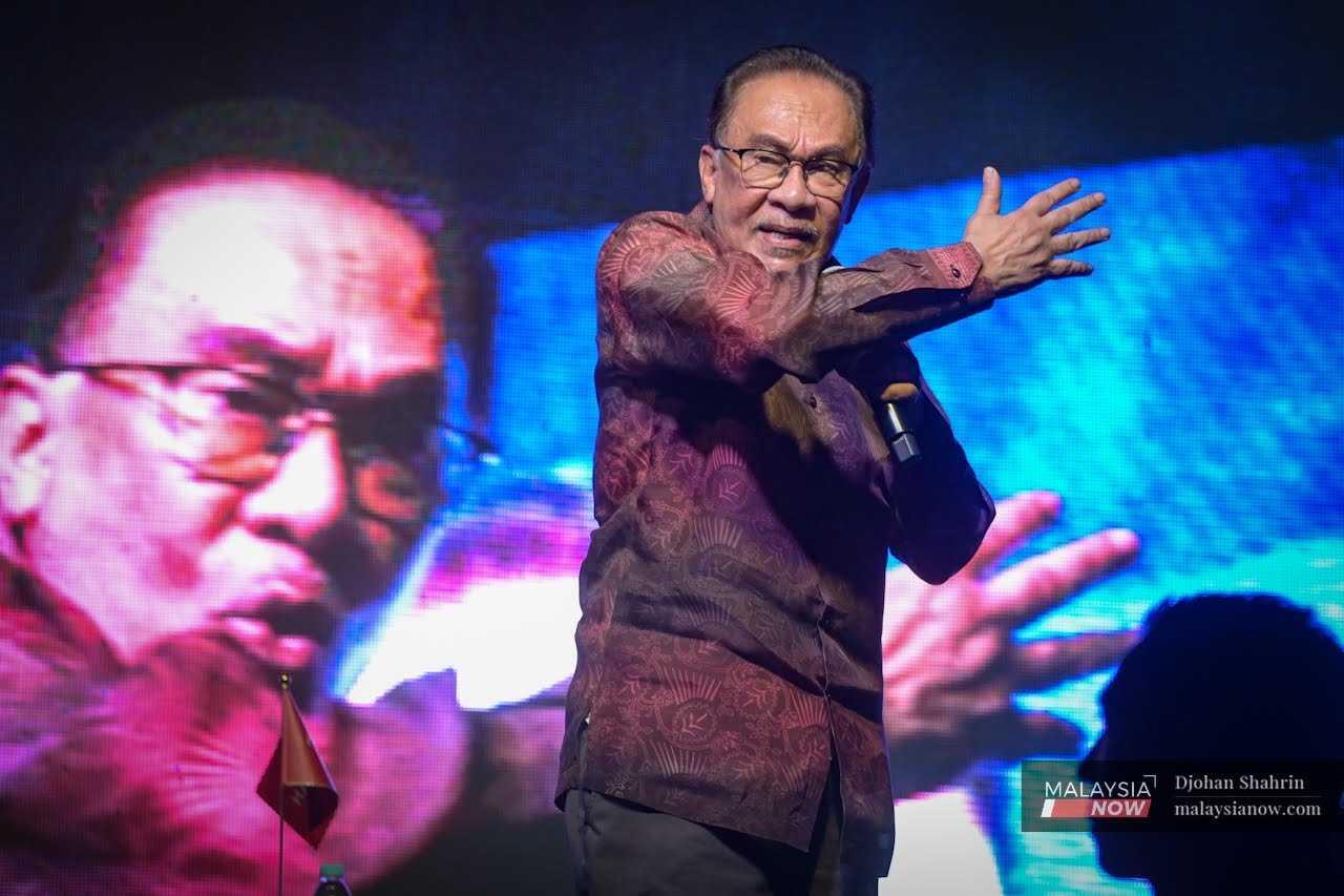 PKR president Anwar Ibrahim speaks at the party's announcement of election candidates for the general election in Ampang, Selangor, on Oct 28. 
