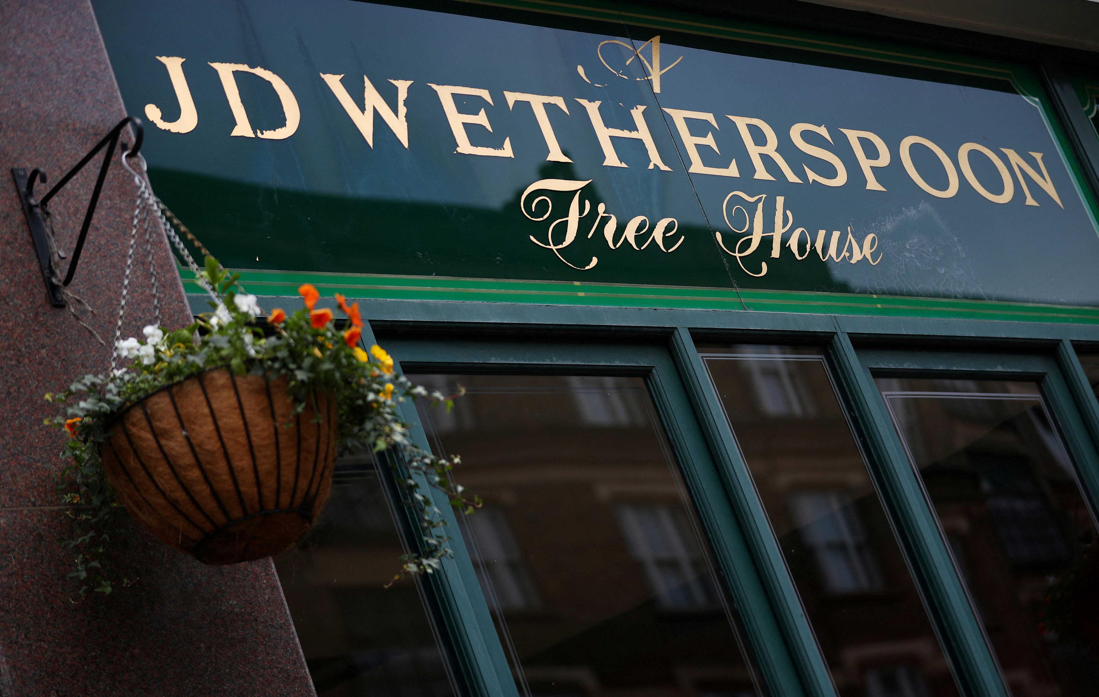 A Wetherspoon's sign on one of the group's pubs in central London, Britain, Jan 23, 2019. Photo: Reuters