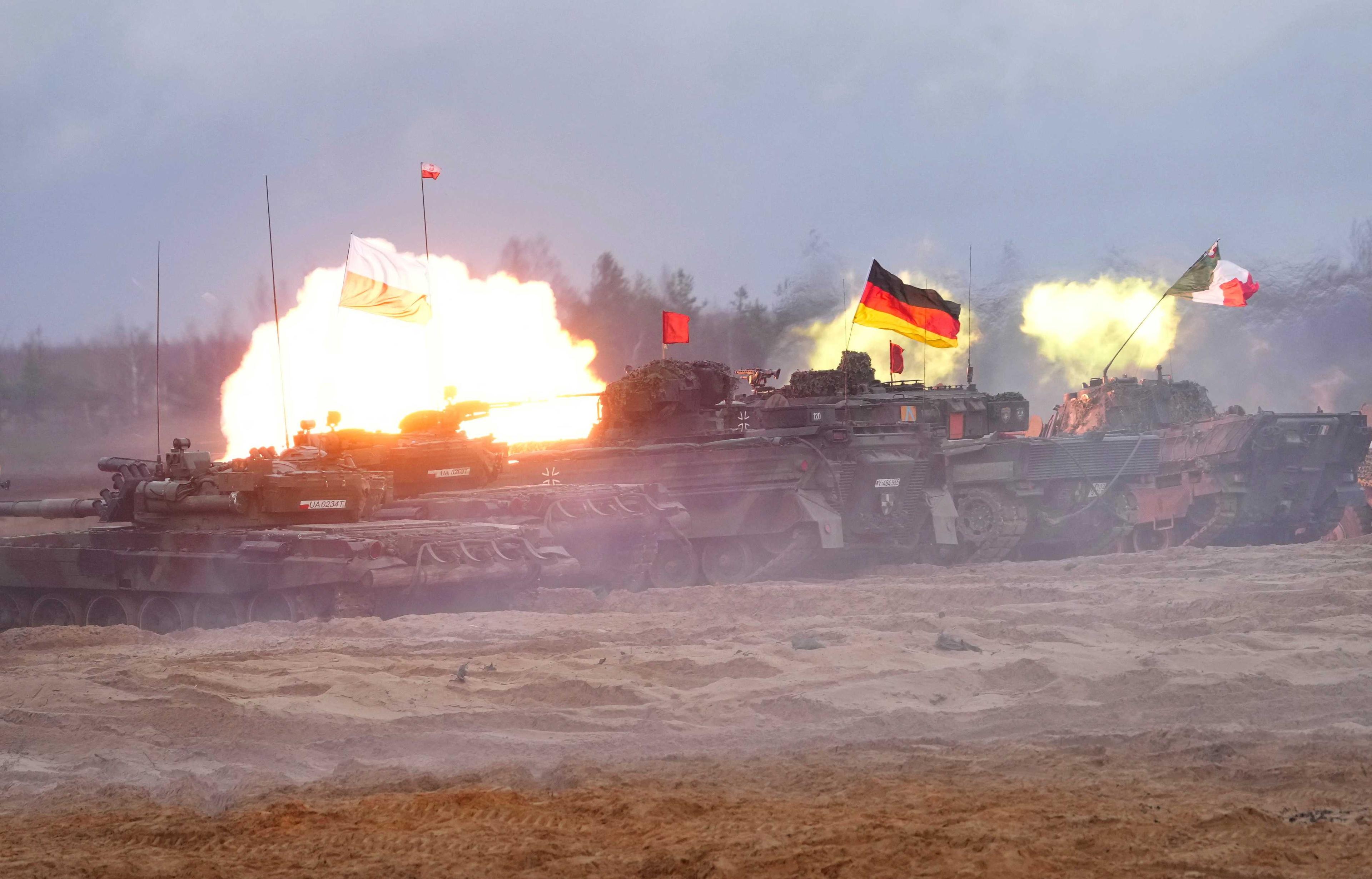 Polish, German and Italian tanks of Nato Enhanced Forward Presence battle groups attend live fire exercise, during Iron Spear 2022 military drill in Adazi, Latvia Nov 15. Photo: Reuters