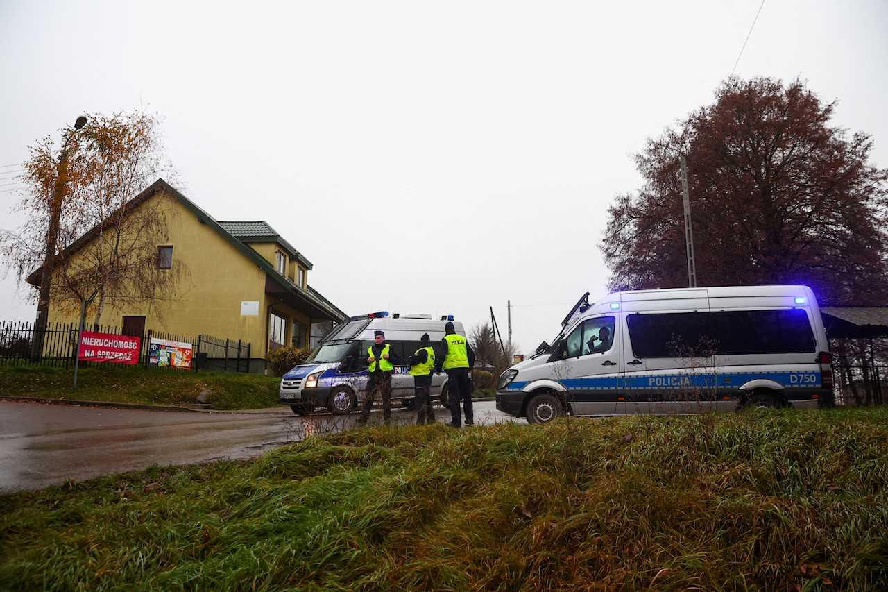 Police officers stand at a blockade after an explosion in Przewodow, a village in eastern Poland near the border with Ukraine, Nov 16. Photo: Reuters