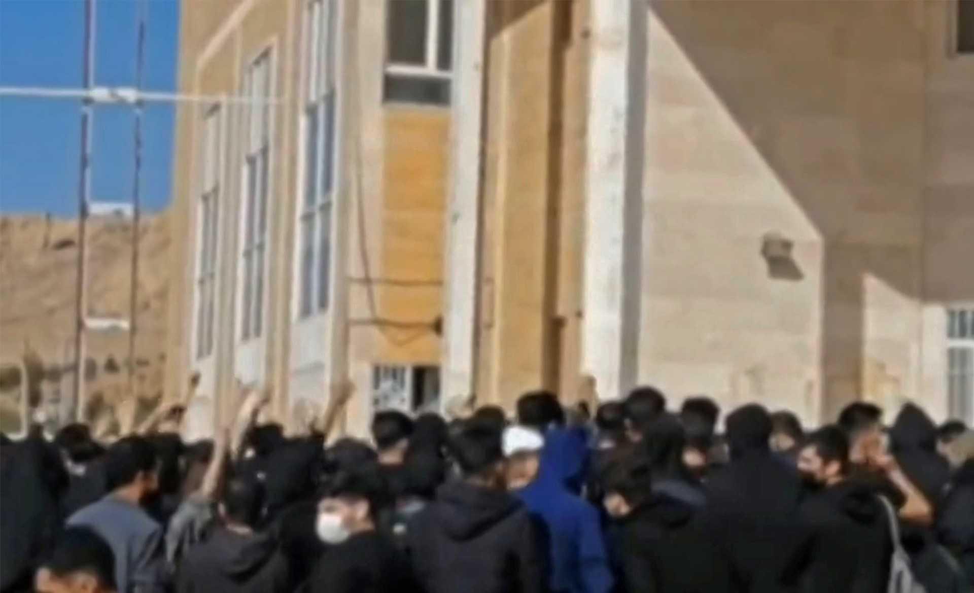 This grab taken from a UGC video made available on the ESN platform on Nov 15 reportedly shows Iranian students chanting slogans at the Kermanshah university in support of the protest movement in western Iran's city of Kermanshah. Photo: AFP