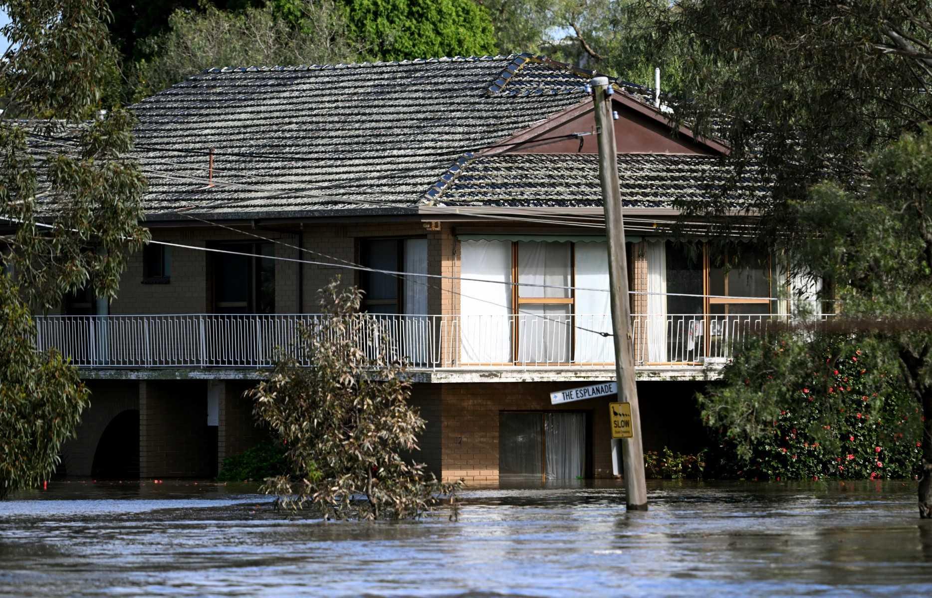 A house is inundated by water during flooding in the Melbourne suburb of Maribyrnong on Oct 14. Photo: AFP