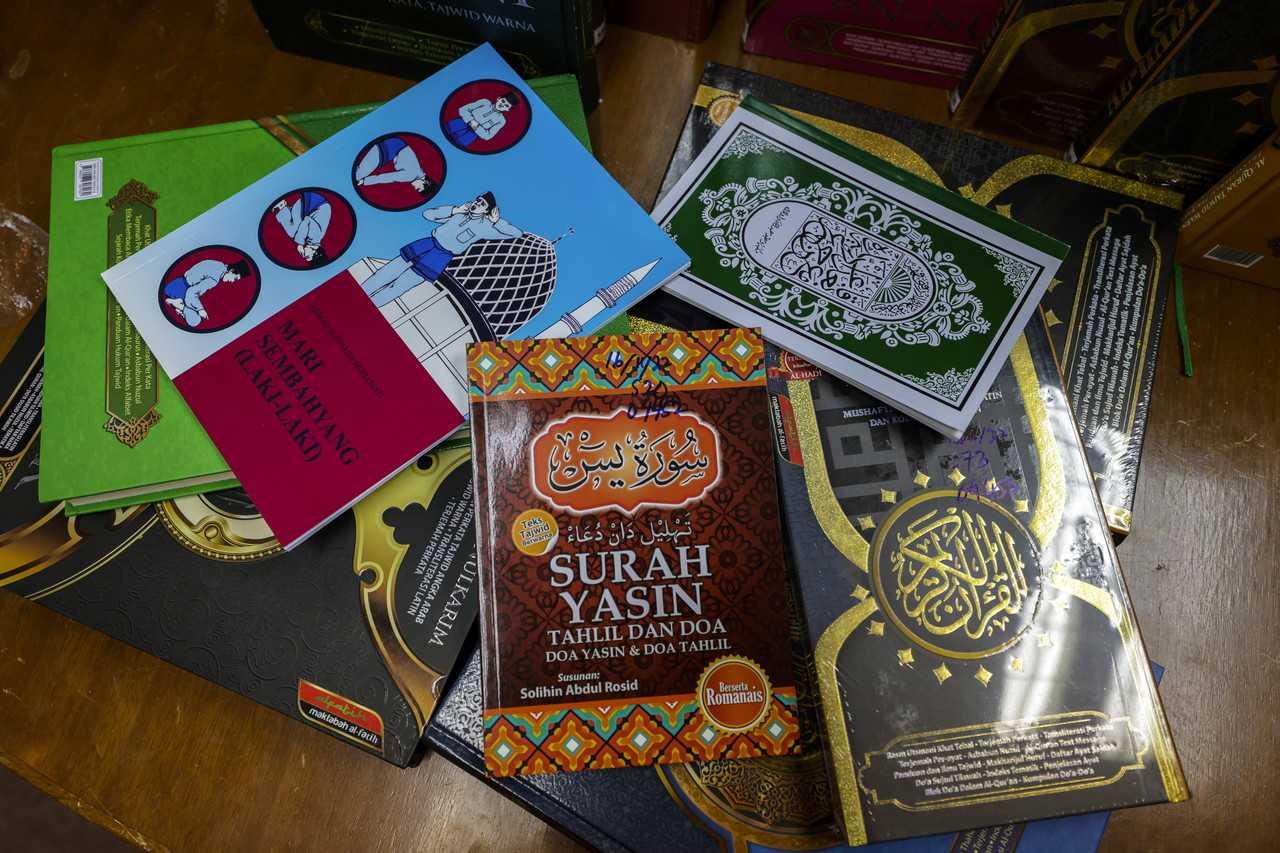 Copies of the Quran and other related publications seized during Op Naskhah, displayed to the media in Shah Alam today. Photo: Bernama
