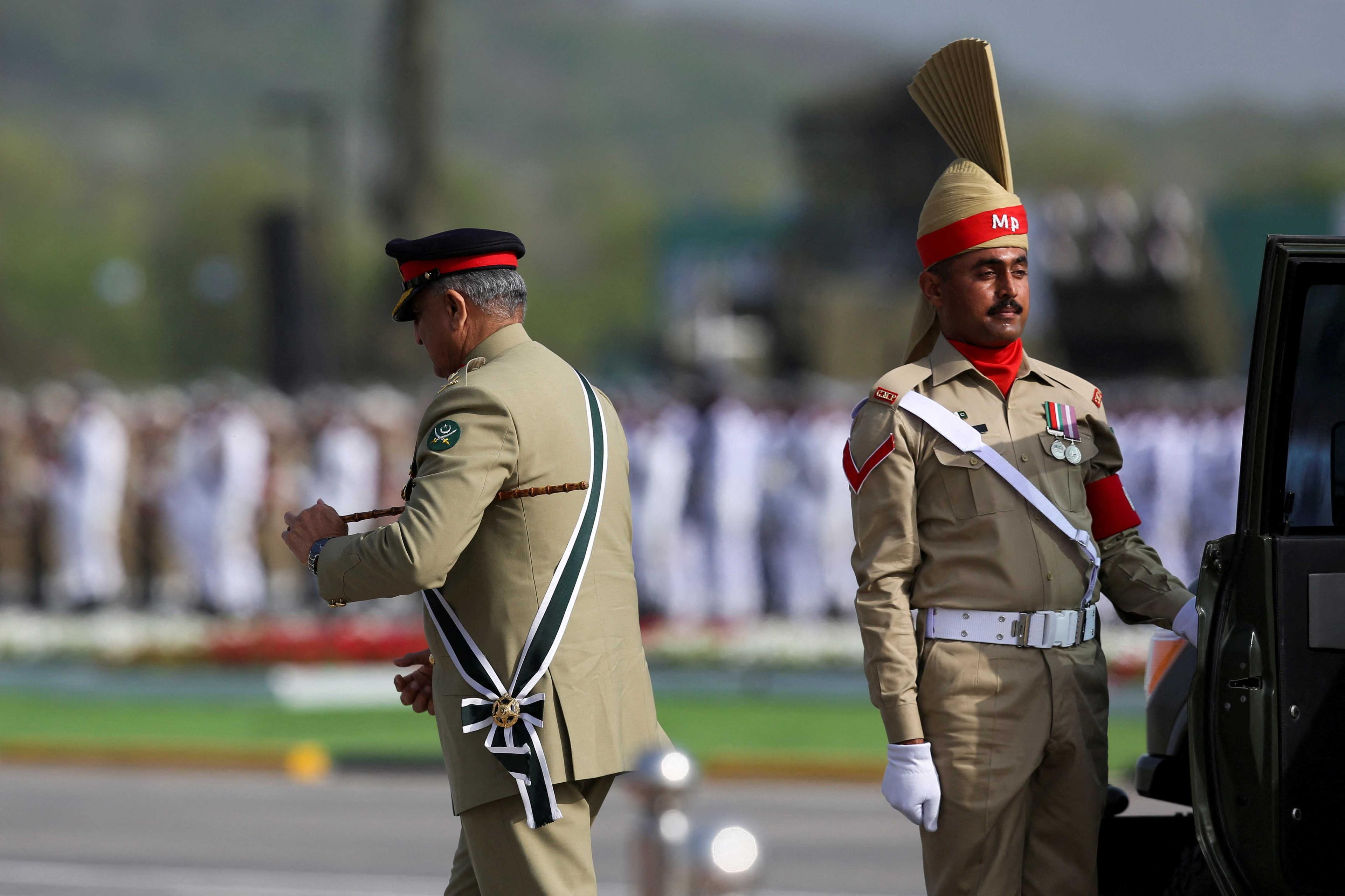 Pakistan's Army Chief of Staff General Qamar Javed Bajwa, leaves his vehicle as he arrives to attend the Pakistan Day military parade in Islamabad, Pakistan March 23. Photo: Reuters