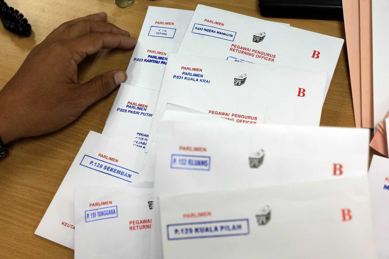 The Election Commission has issued 365,686 postal votes for the 15th general election to be held tomorrow. Photo: Bernama