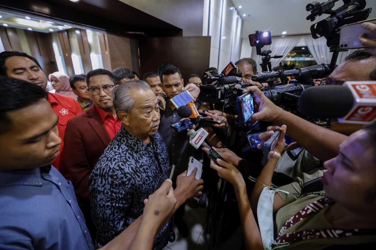 Perikatan Nasional chairman Muhyiddin Yassin speaks to reporters after a Bersatu Supreme Council meeting last night. Photo: Bernama