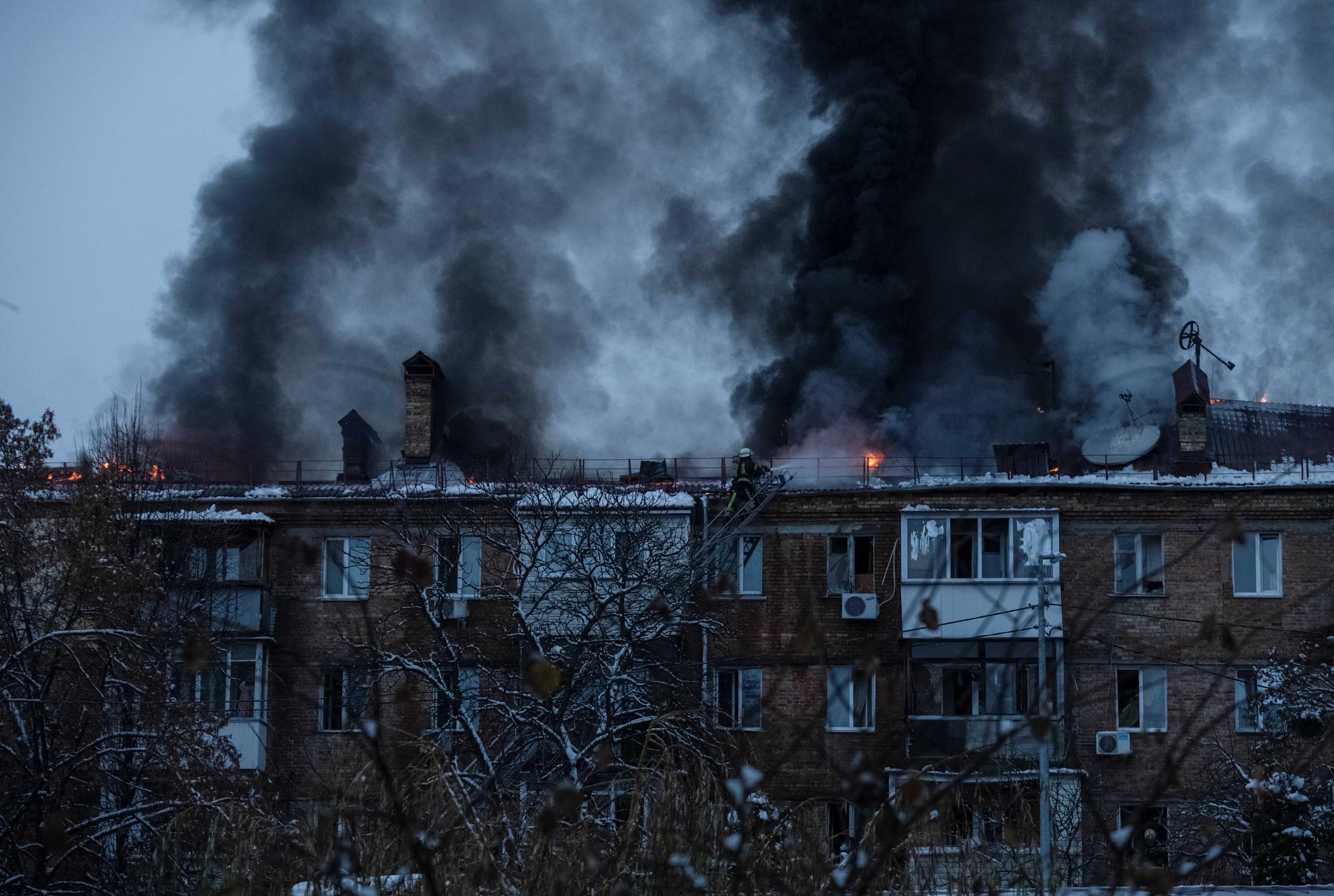 Rescuers work at a site of a residential building destroyed by a Russian missile attack, as Russia's attack on Ukraine continues, in the town of Vyshhorod, near Kyiv, Ukraine, Nov 23. Photo: Reuters