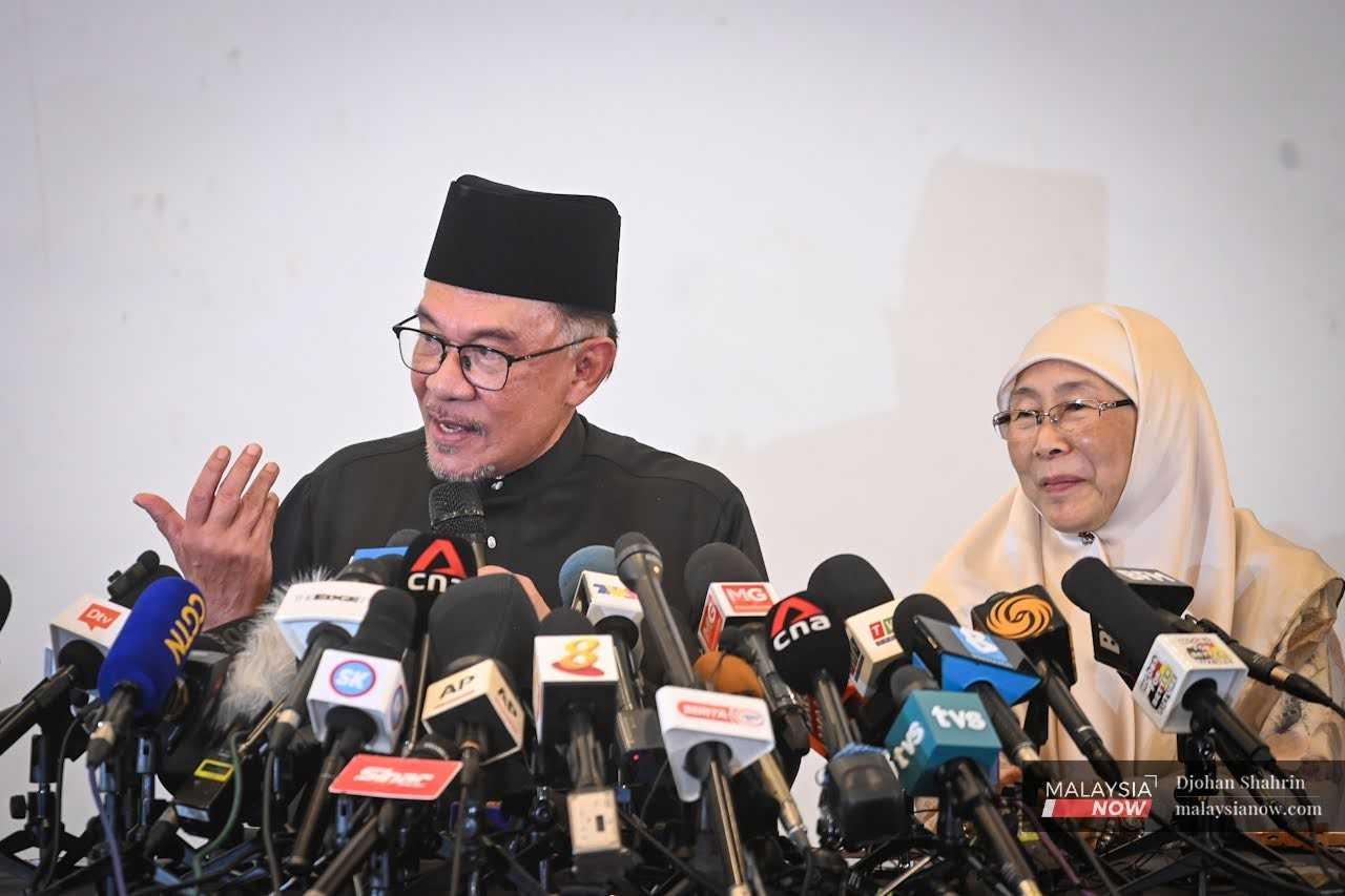 Anwar Ibrahim speaks at his first press conference as prime minister in Kajang, Selangor, yesterday. 
