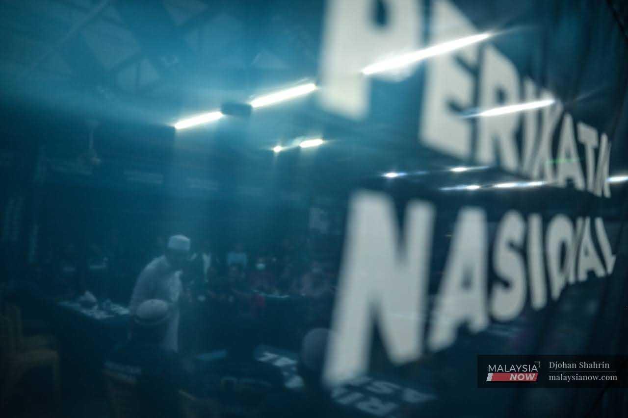 Bersatu deputy president Ahmad Faizal Azumu speaks on the campaign trail in Tambun ahead of the Nov 19 polls.