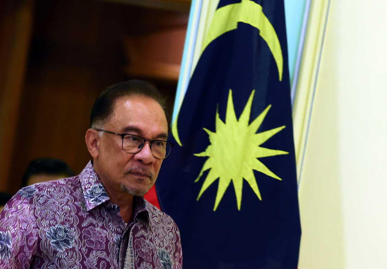 Prime Minister Anwar Ibrahim speaks at a press conference in Putrajaya yesterday. Photo: Bernama