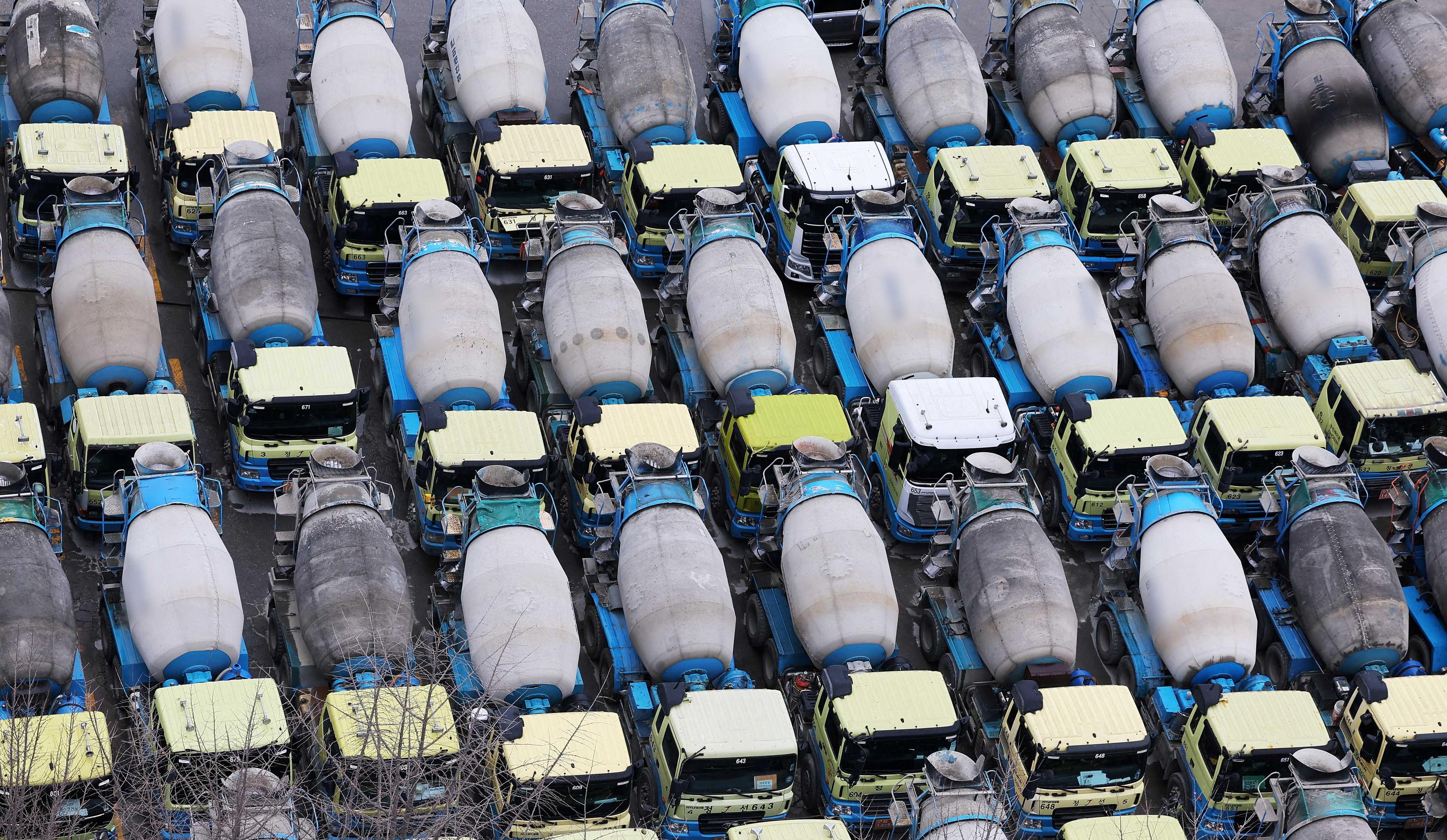 Concrete mixer trucks are parked at a factory due to a strike by a truckers' union in Anyang, South Korea Nov 28. Photo: Reuters
