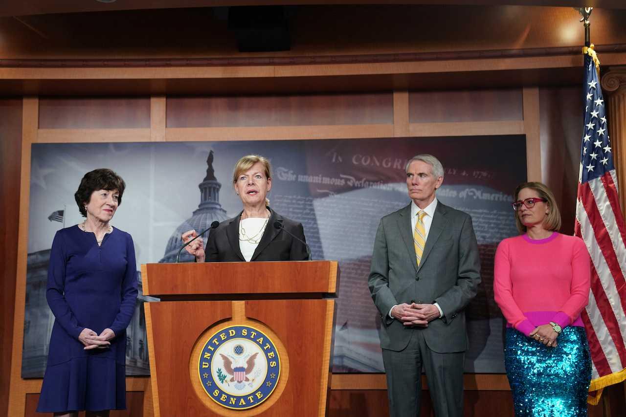 Senators from the Democratic and Republican parties speak during a news conference on the passage of the Respect for Marriage Act at the US Capitol in Washington, DC, Nov 29. Photo: Reuters