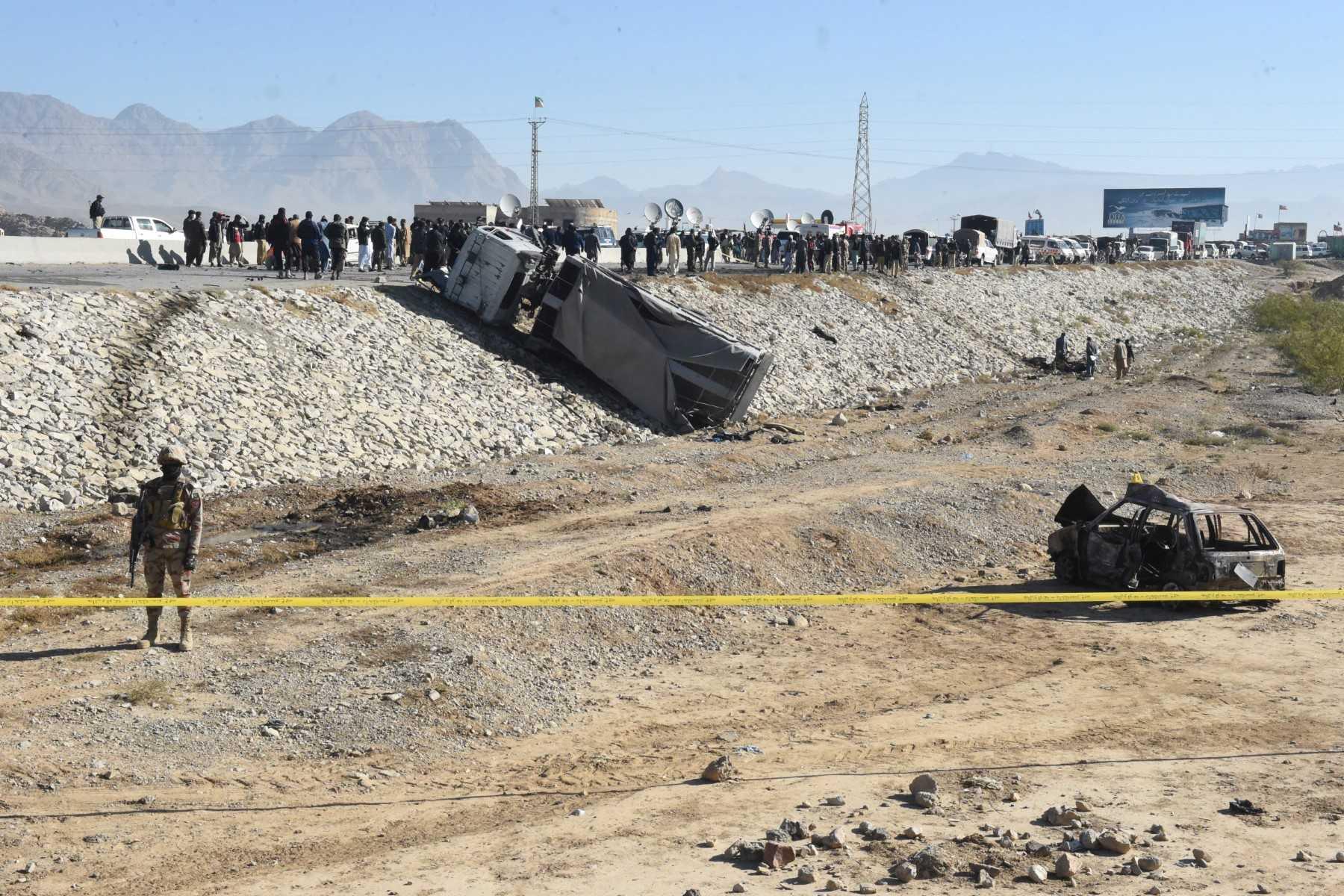 A security official stands guard at the site of a suicide bomb attack targeting a police truck in Quetta on Nov 30. Photo: AFP
