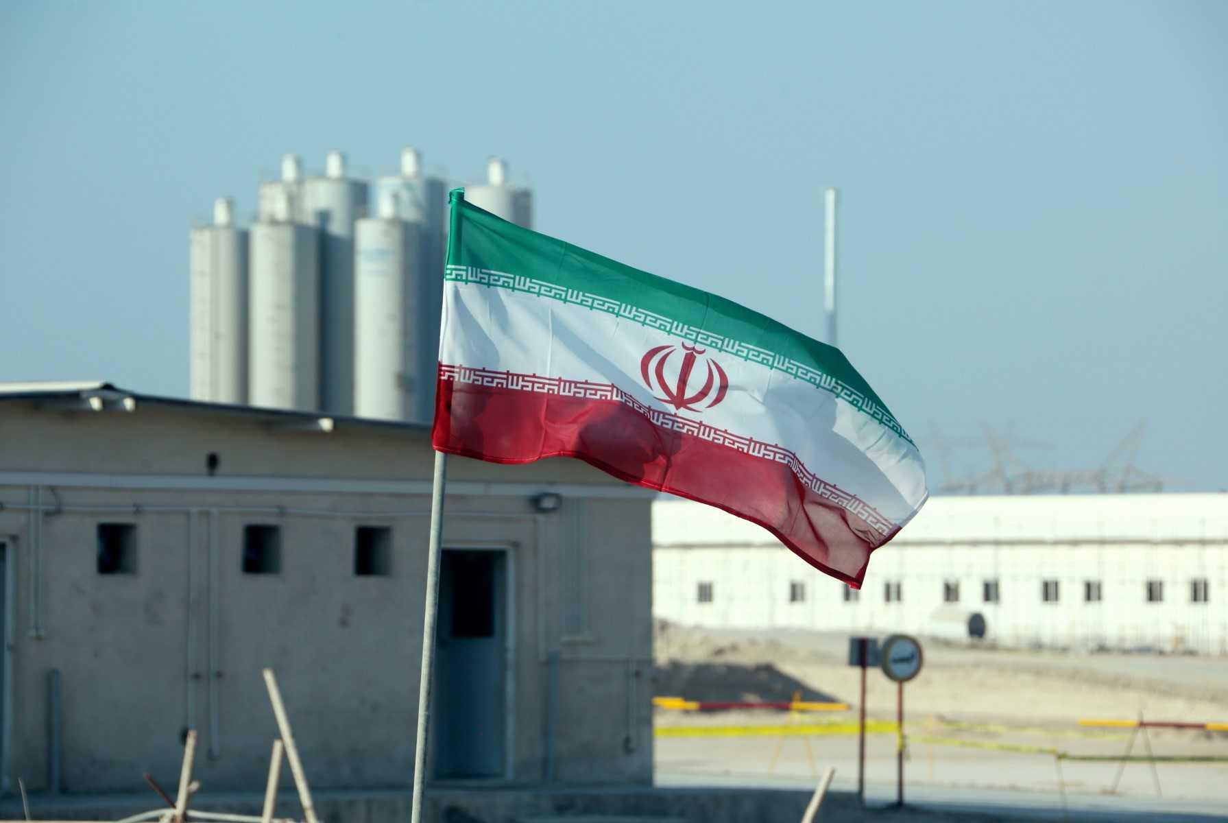 Bendera Iran di loji janakuasa nuklear Bushehr di Iran, semasa upacara rasmi untuk memulakan kerja-kerja pada reaktor kedua di kemudahan itu pada 10 November 2019. Gambar: AFP