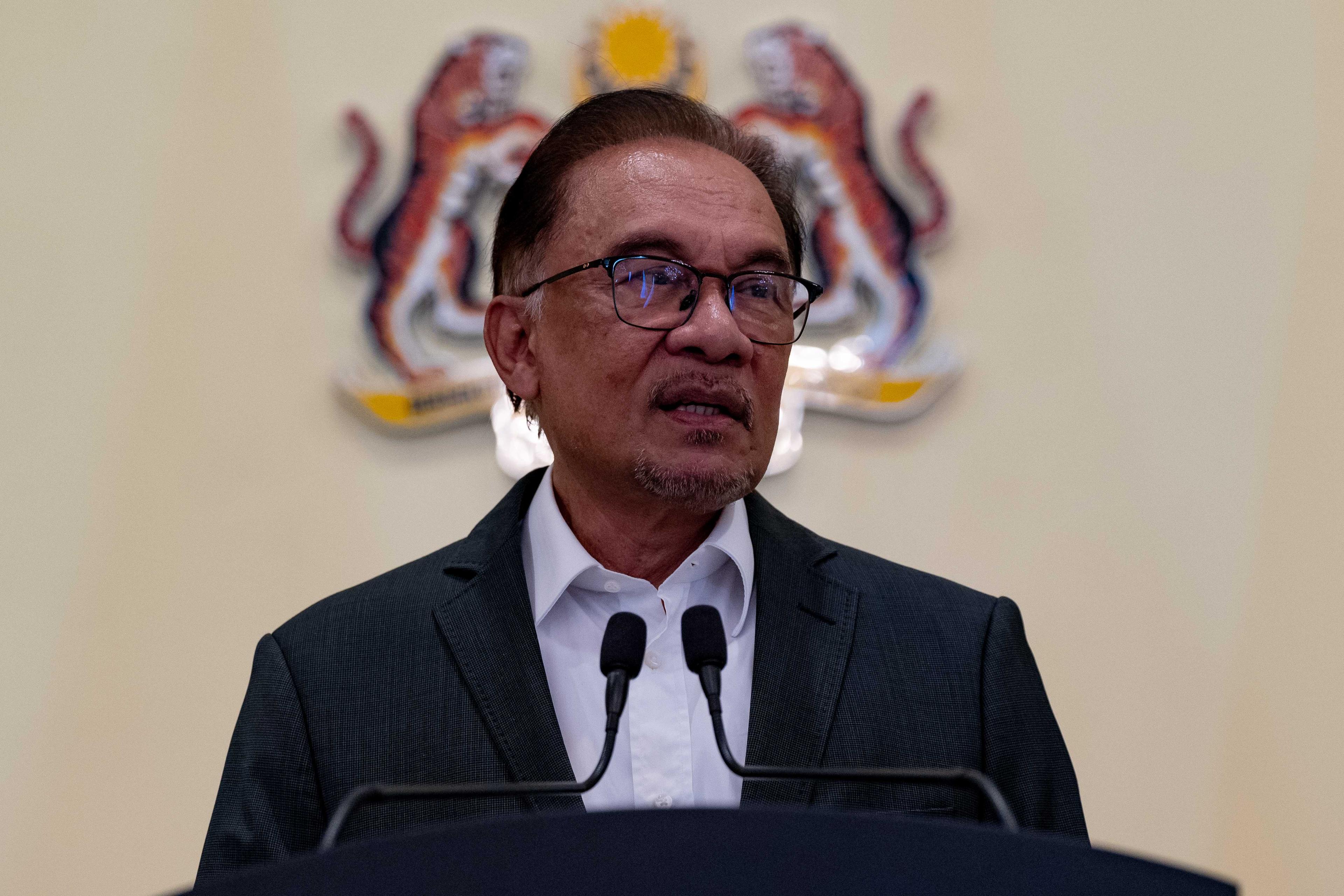 Perdana Menteri Anwar Ibrahim pada sidang media di Putrajaya hari ini.