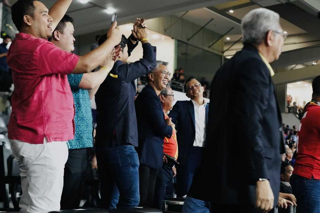 Tengku Zafrul Aziz enjoys the Malaysia Cup final between Selangor and Johor at the Bukit Jalil National Stadium on Nov 26, just days before he made a surprise return to the Cabinet despite losing the recent polls. Photo: Twitter