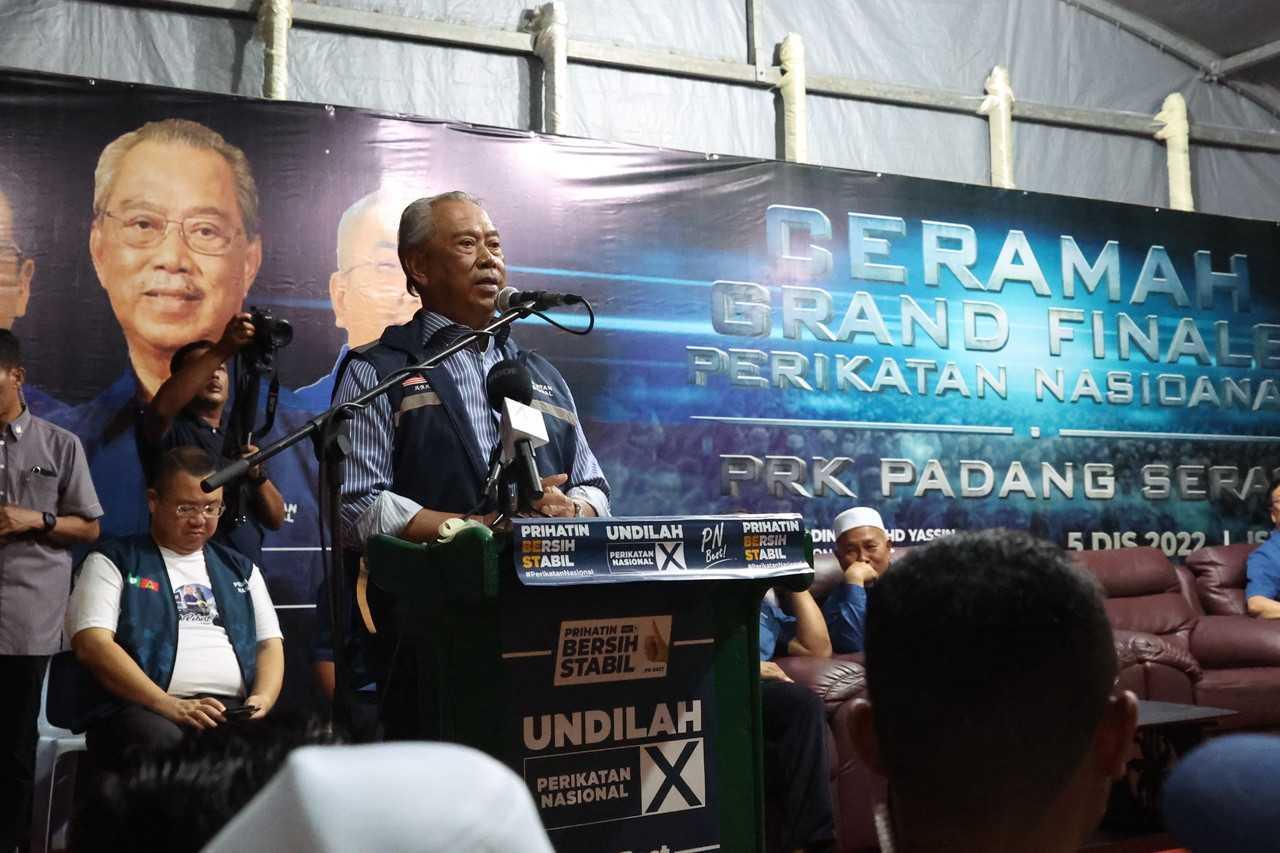 Perikatan Nasional chairman Muhyiddin Yassin speaks at a campaign event for the Padang Serai polls in Kulim last night. Photo: Bernama