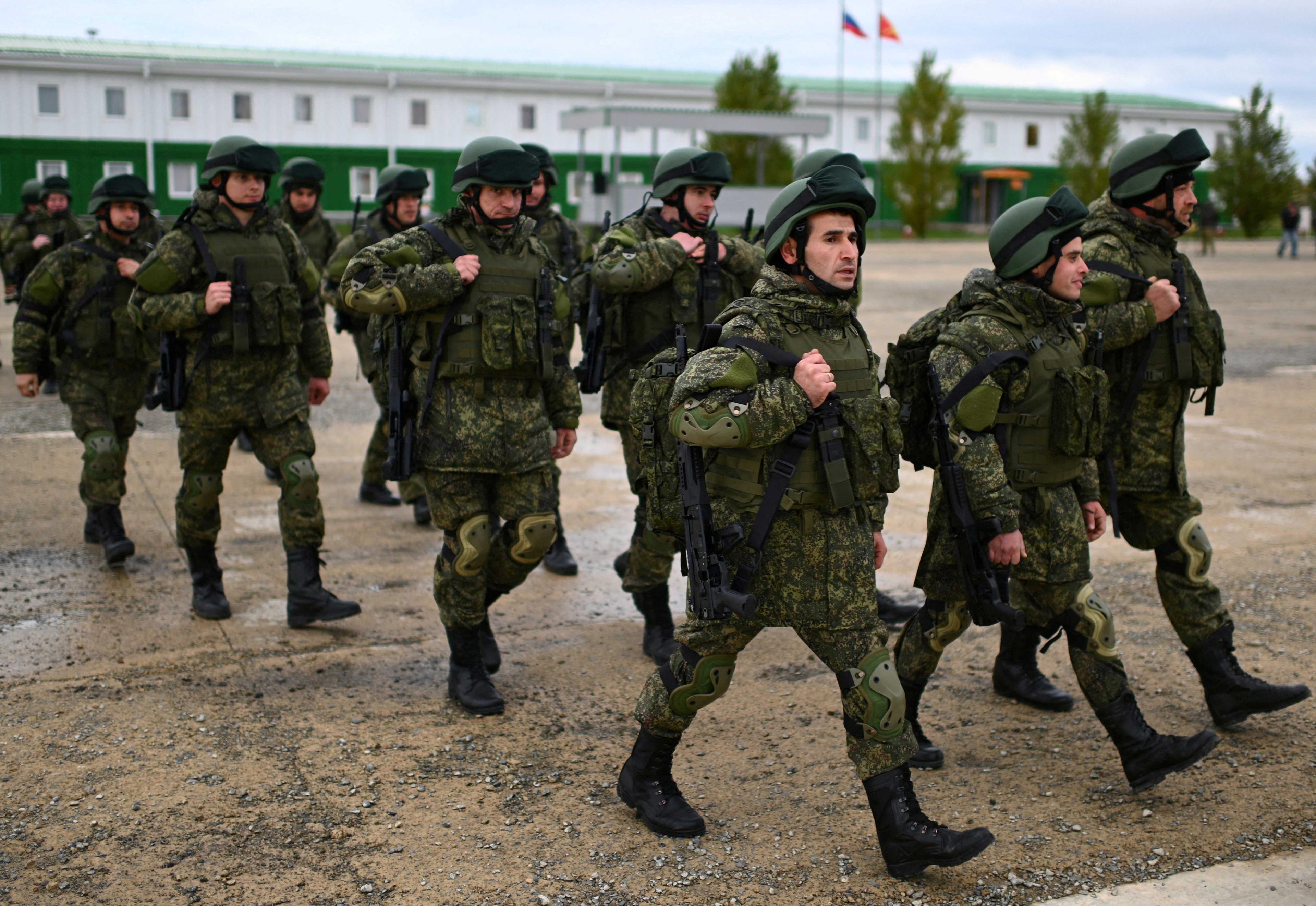 Russian reservists recruited during the partial mobilisation of troops attend a ceremony before departing to the zone of Russia-Ukraine conflict, in the Rostov region, Russia Oct 31. Photo: Reuters