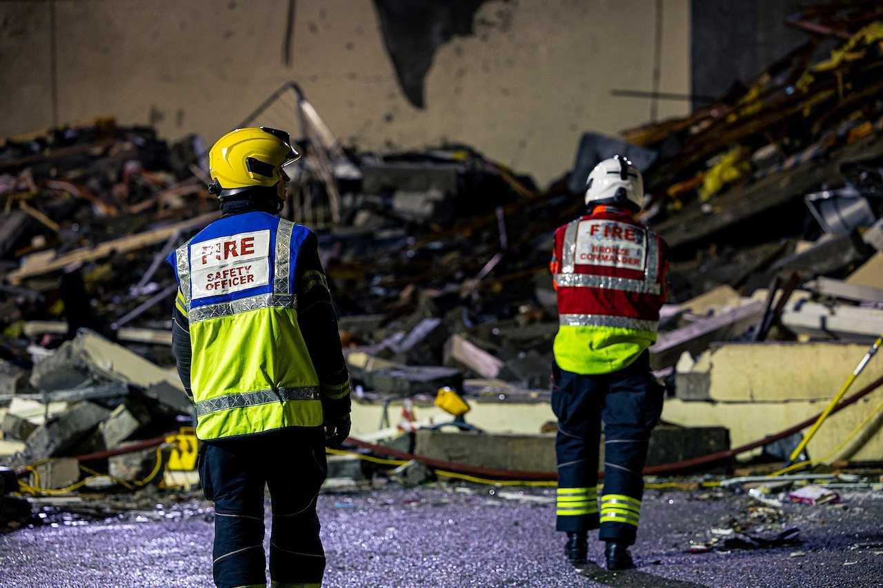 Search crew work at the blast site at a block of flats in Saint Helier, on the island of Jersey, Dec 10, in this picture obtained from social media. Photo: Reuters