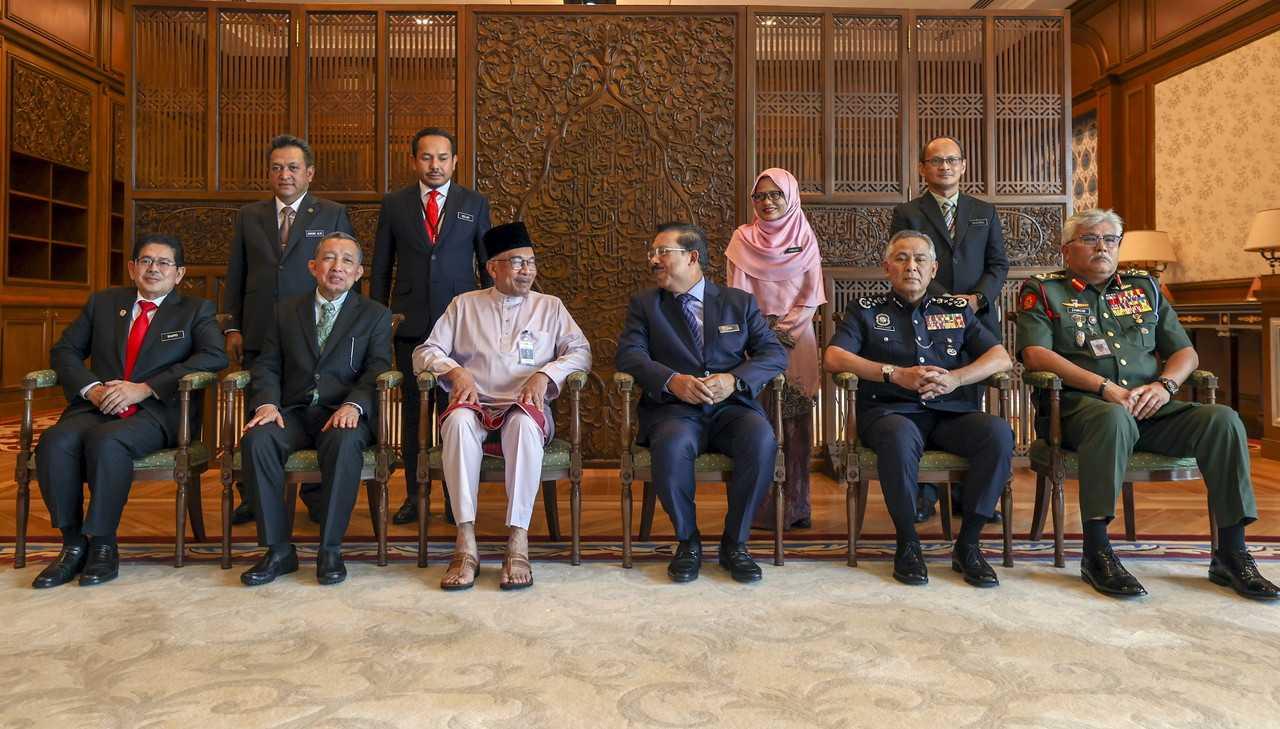 Public Service Department director-general Mohd Shafiq Abdullah (seated, left) with Prime Minister Anwar Ibrahim and other high-ranking government officials at the Perdana Putra building in Putrajaya on Nov 25. Photo: Bernama