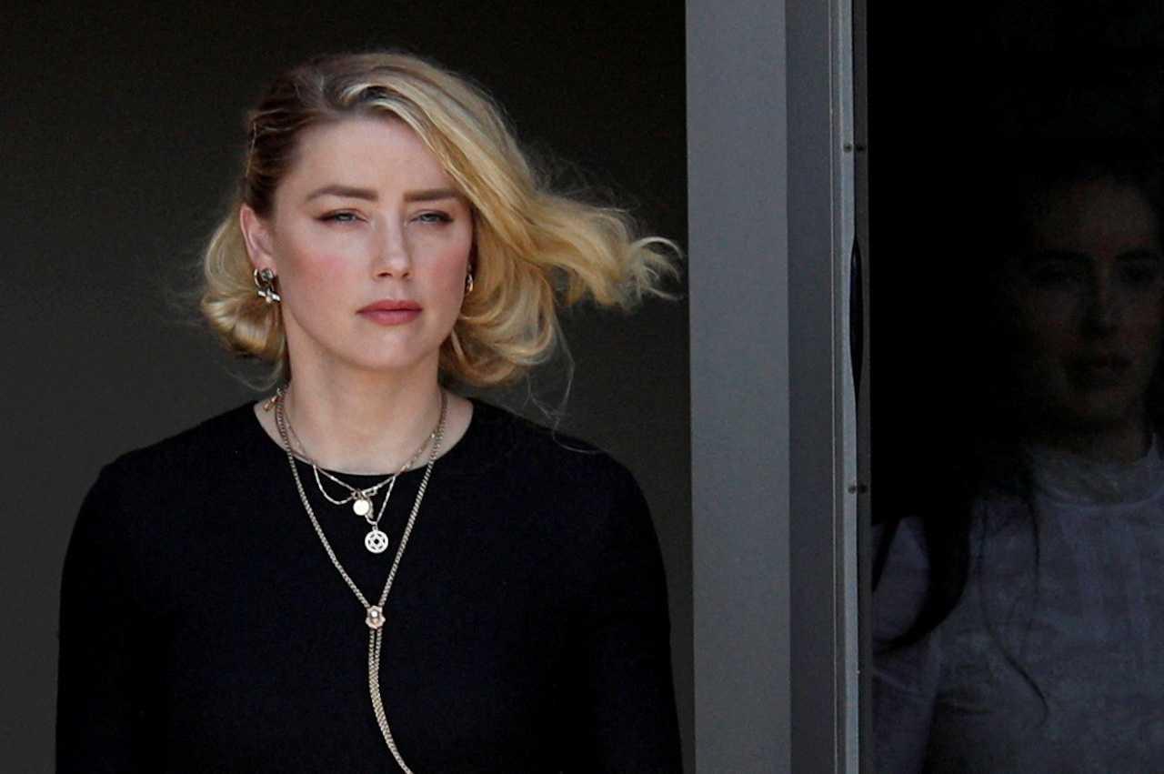 Amber Heard leaves the courthouse after the jury announced split verdicts in favour of both her ex-husband Johnny Depp and Heard on their claim and counter-claim in Fairfax, Virginia, US, June 1. Photo: Reuters
