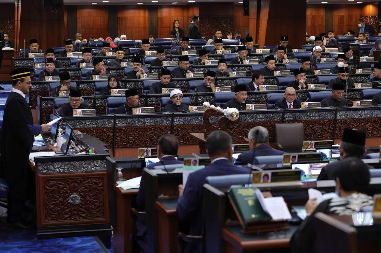 MPs attend the first meeting of the first session of the 15th Parliament in Kuala Lumpur on Dec 19. Photo: Bernama