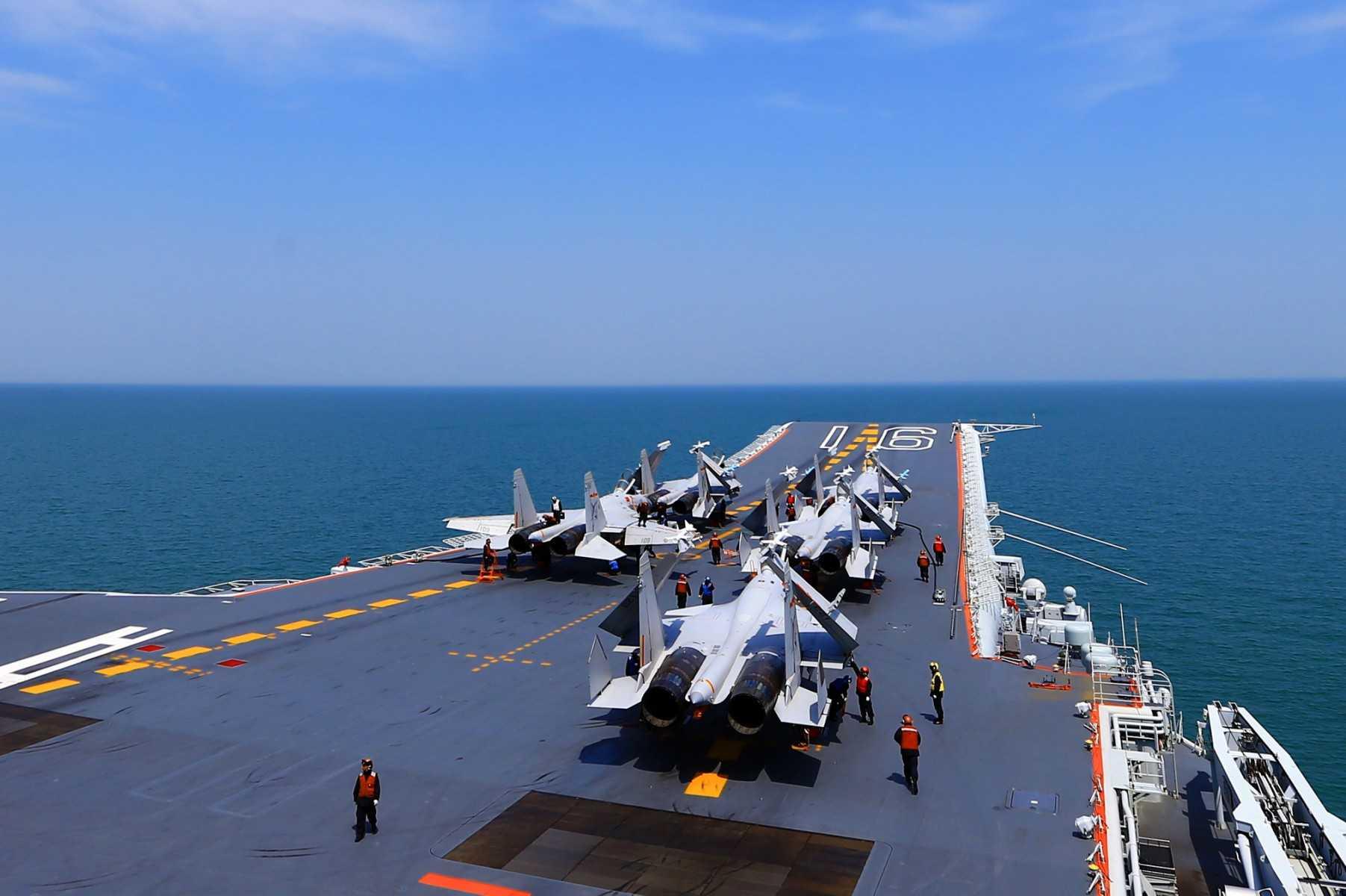 This photo taken on April 24, 2018 shows J15 fighter jets on China's sole operational aircraft carrier, the Liaoning, during a drill at sea. Photo: AFP