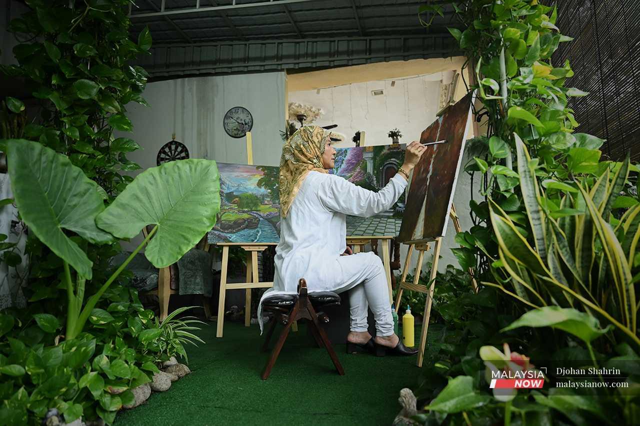 Much of her painting is done in this green nook, one of her favourite places to work. 