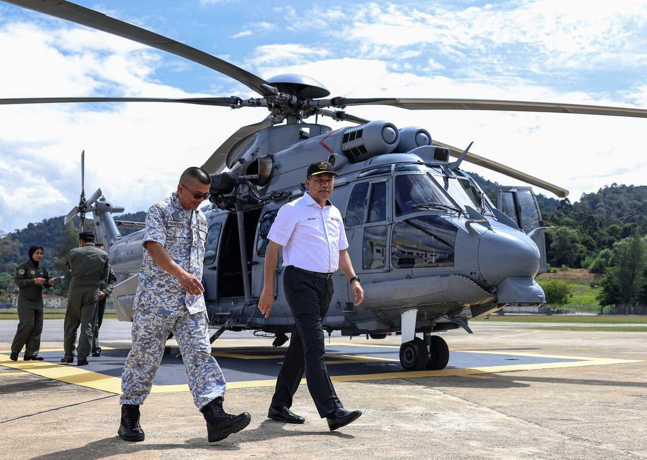Defence Minister Mohamad Hasan arrives at the Royal Malaysian Navy base in Lumut today. Photo: Bernama