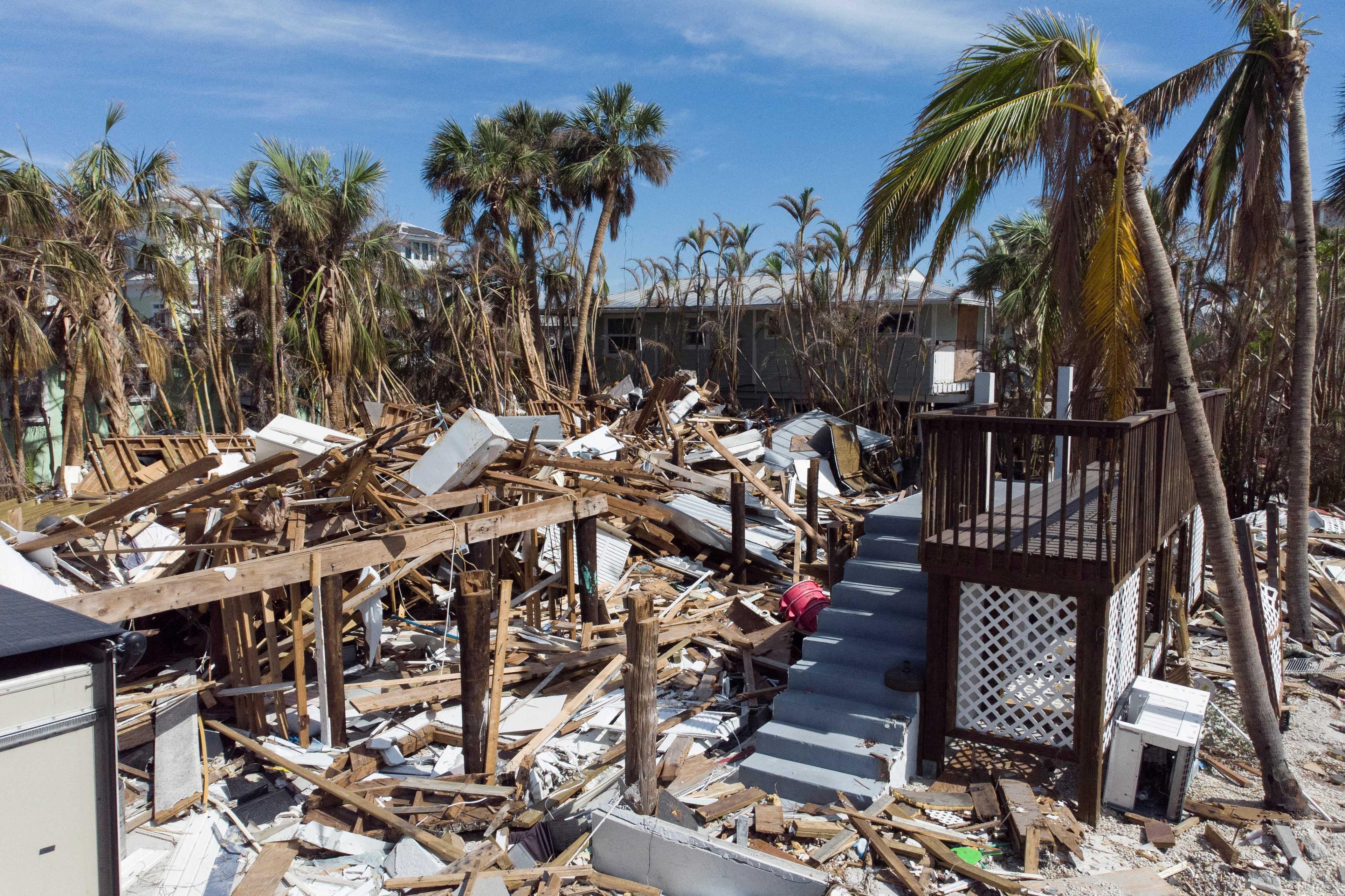 Remains of destroyed houses are seen almost one month after Hurricane Ian landfall in Fort Myers Beach, Florida, US, Oct 26, 2022. Photo: Reuters